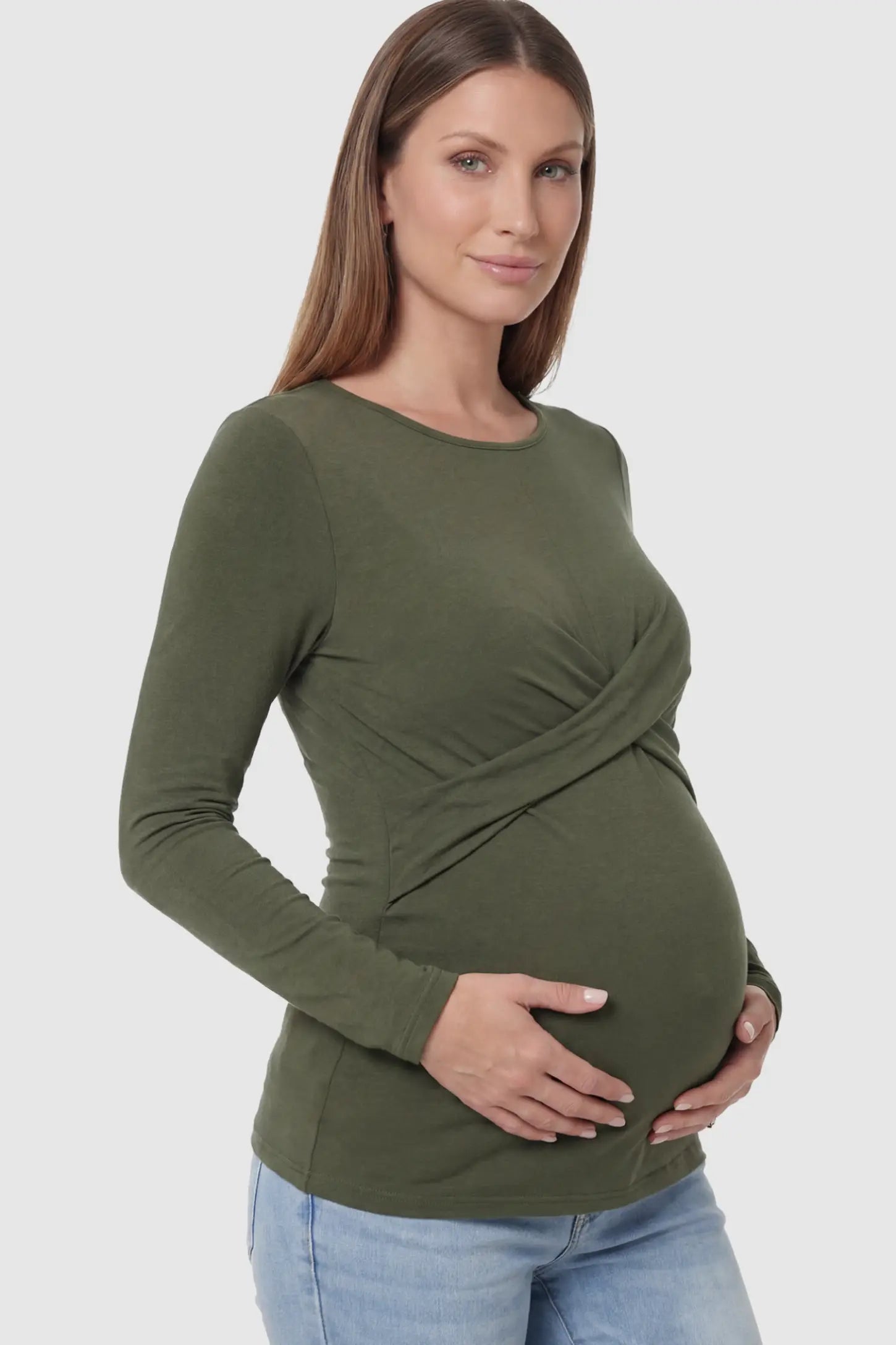 Cross Front Long Sleeve Maternity Top Cross Front Long Sleeve Maternity Top in Olive Green featuring a crossover waist detail on a pregnant model showing side.