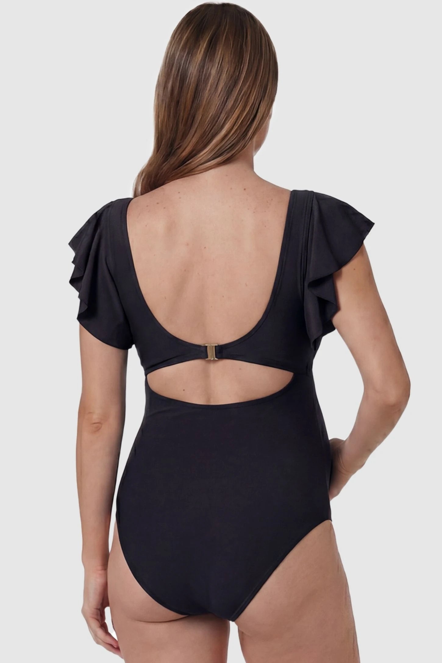 Cutout Twist-Front Maternity Monokini Cutout Twist-Front Maternity Monokini in Black featuring a secure gold clasp closure on a pregnant model, back view.