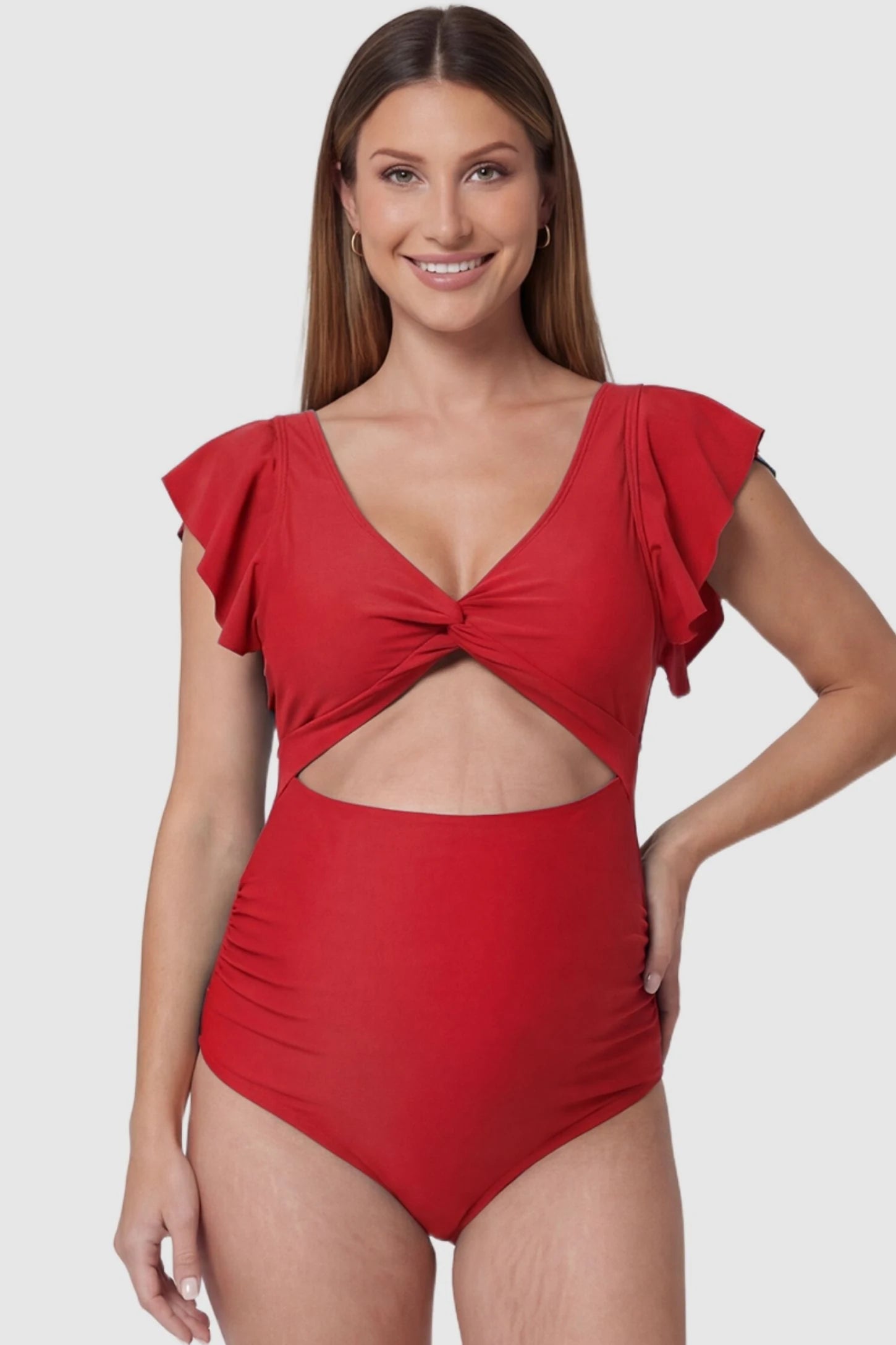 Cutout Twist-Front Maternity Monokini Cutout Twist-Front Maternity Monokini in Red featuring a supportive twist-front knot on a pregnant model, front view.