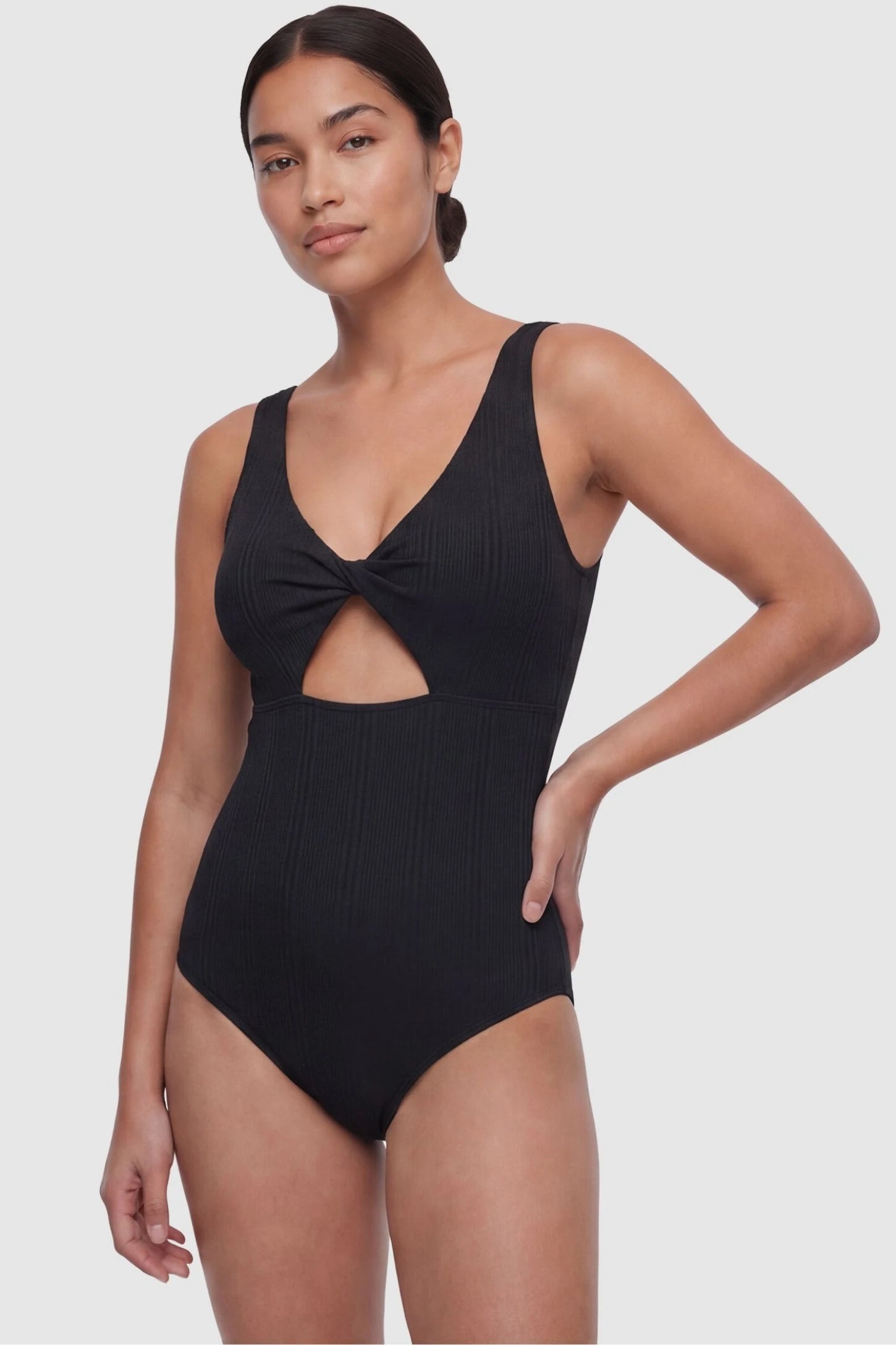 Cutout Twisted V-Neck Maternity Swimsuit Cutout Twisted V-Neck Maternity Swimsuit in Black featuring a front view on a non-pregnant postpartum model.