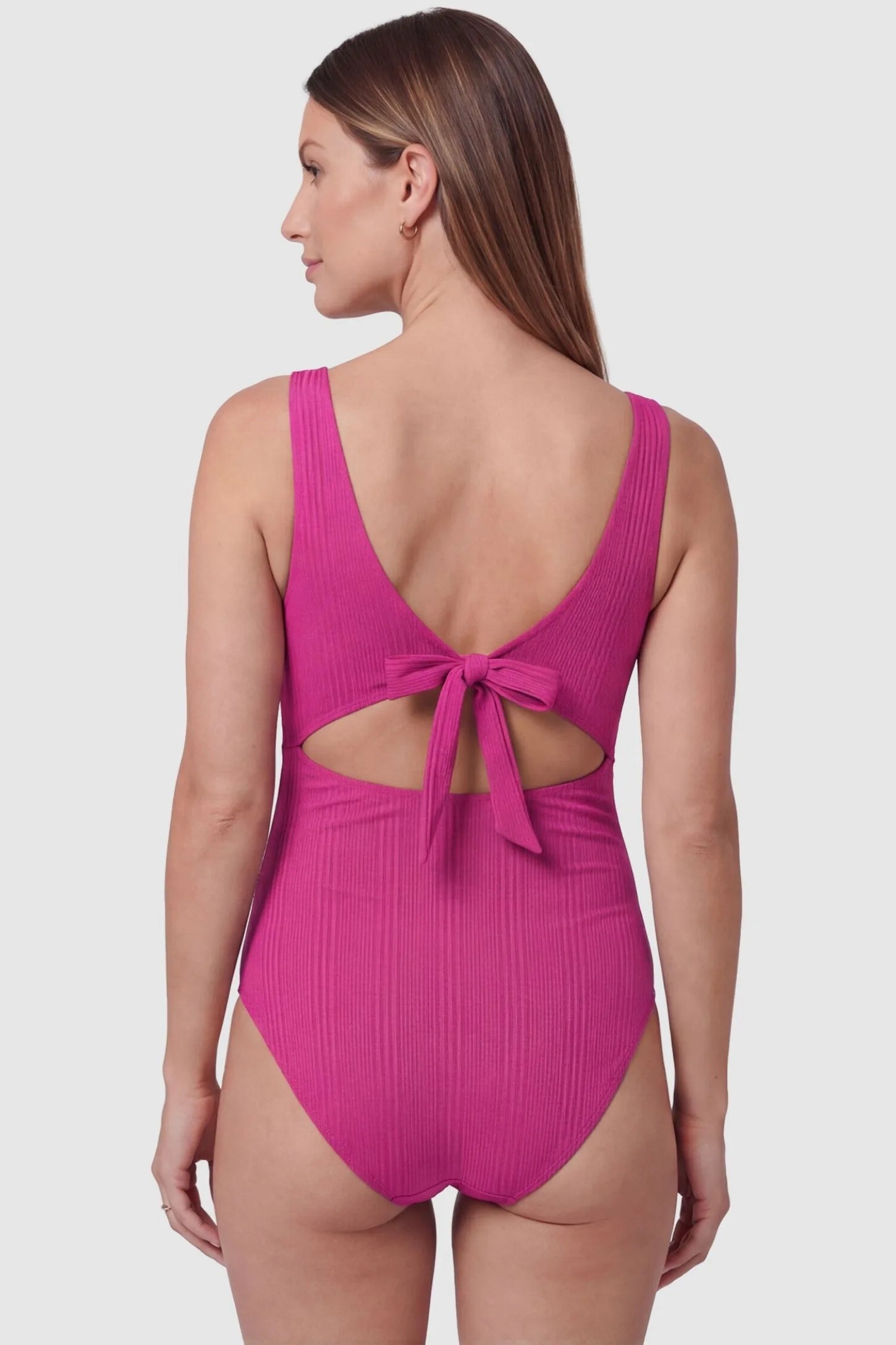 Cutout Twisted V-Neck Maternity Swimsuit Cutout Twisted V-Neck Maternity Swimsuit in Fuchsia featuring a back view with a tie closure on a pregnant model.