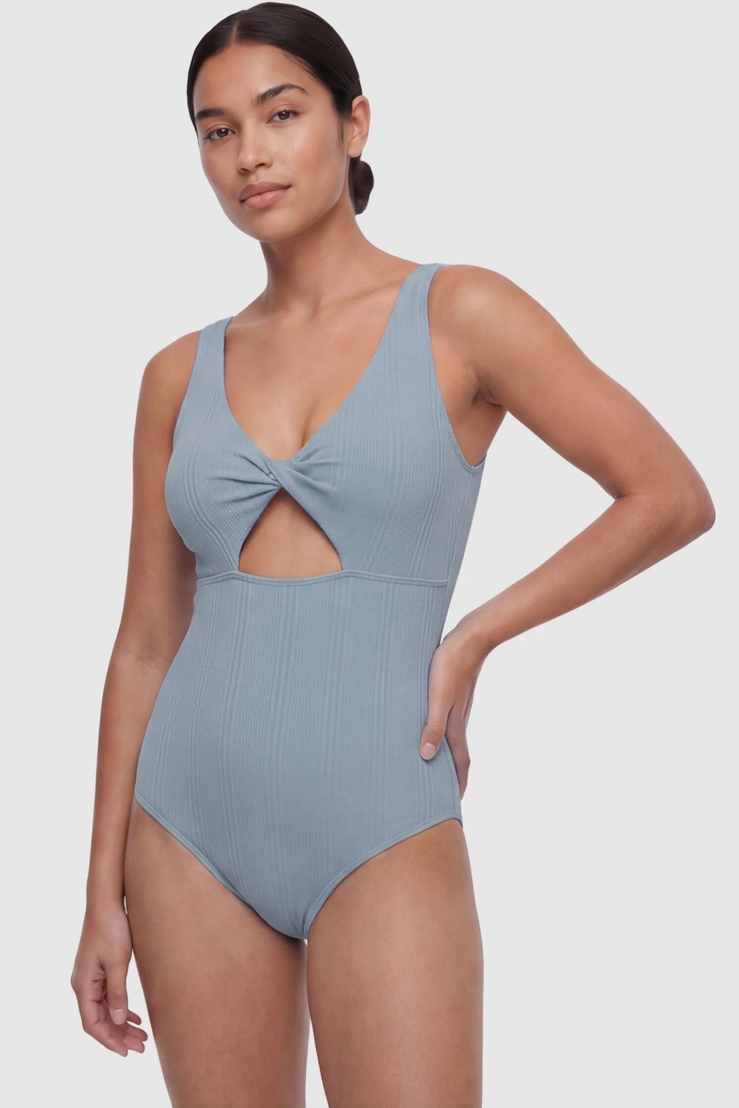 Cutout Twisted V-Neck Maternity Swimsuit Cutout Twisted V-Neck Maternity Swimsuit in Light Blue featuring a front view on a non-pregnant postpartum model.