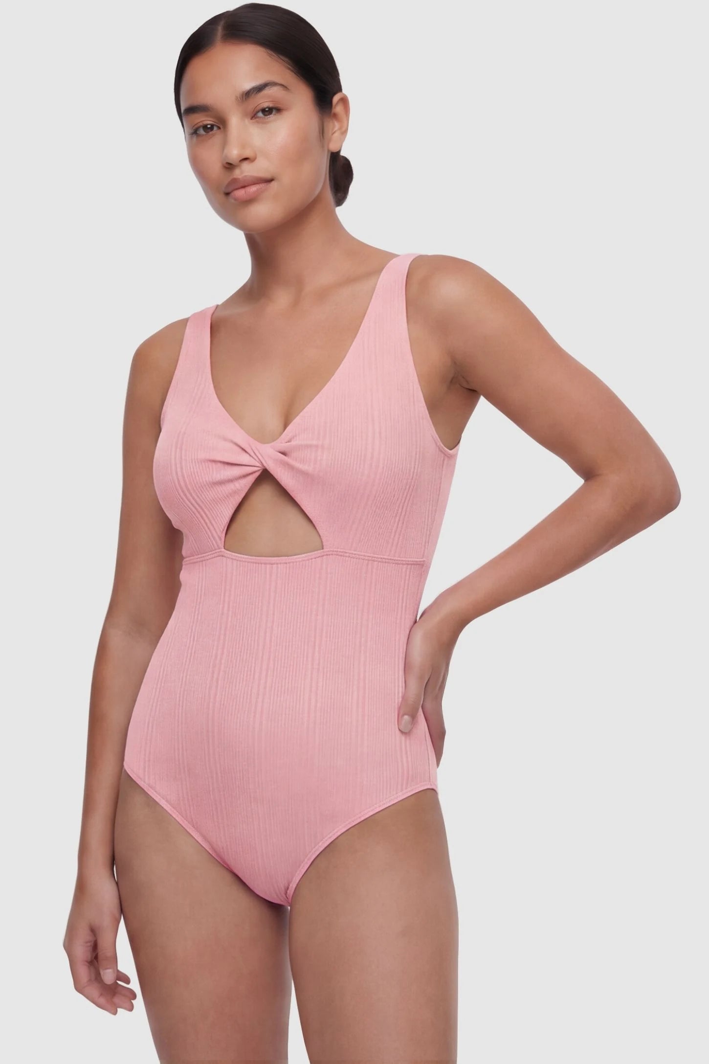 Cutout Twisted V-Neck Maternity Swimsuit Cutout Twisted V-Neck Maternity Swimsuit in Pink featuring a front view on a non-pregnant postpartum model.