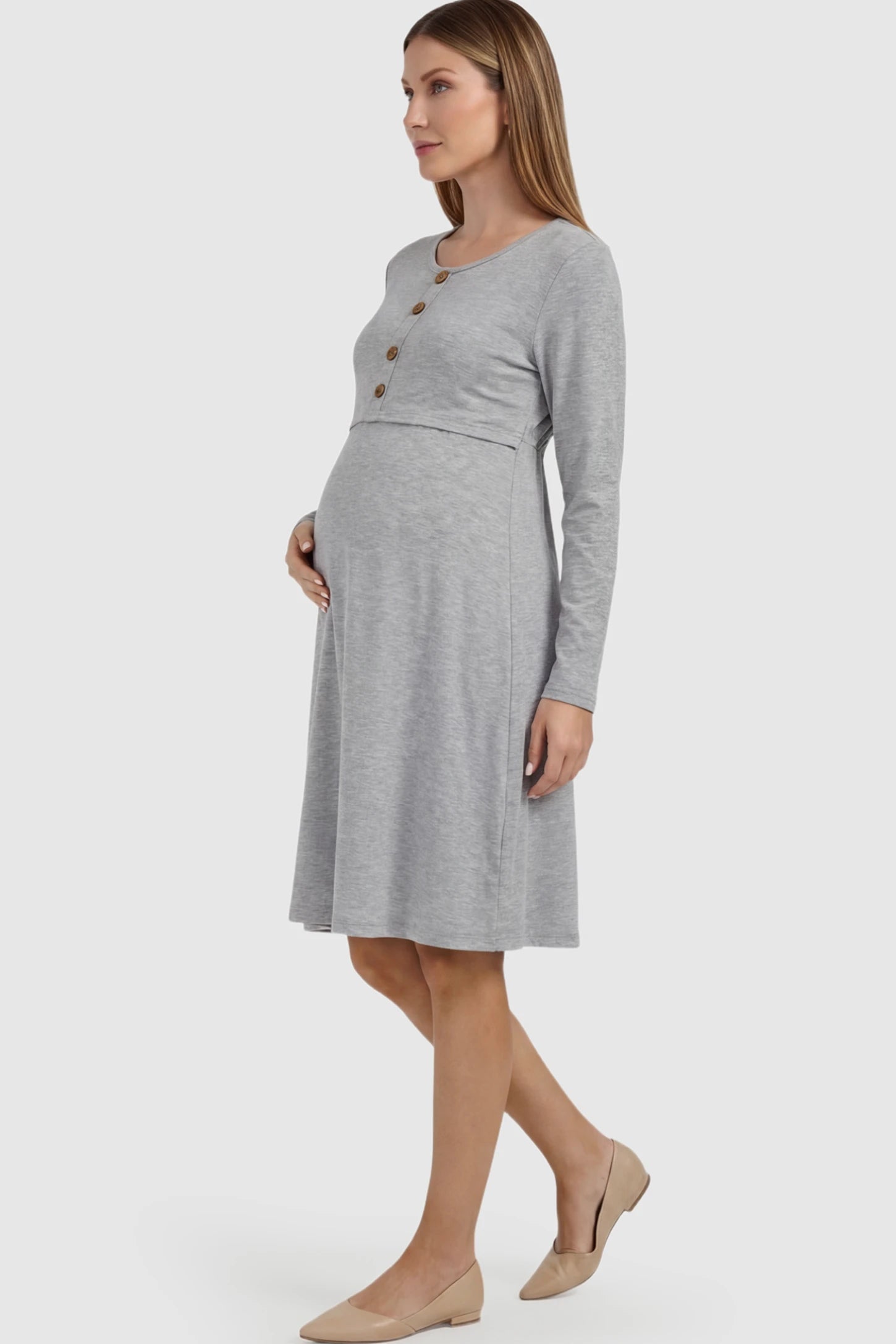 Double Layer Long Sleeve Maternity & Nursing Dress in Gray featuring decorative buttons on a pregnant model showing side.
