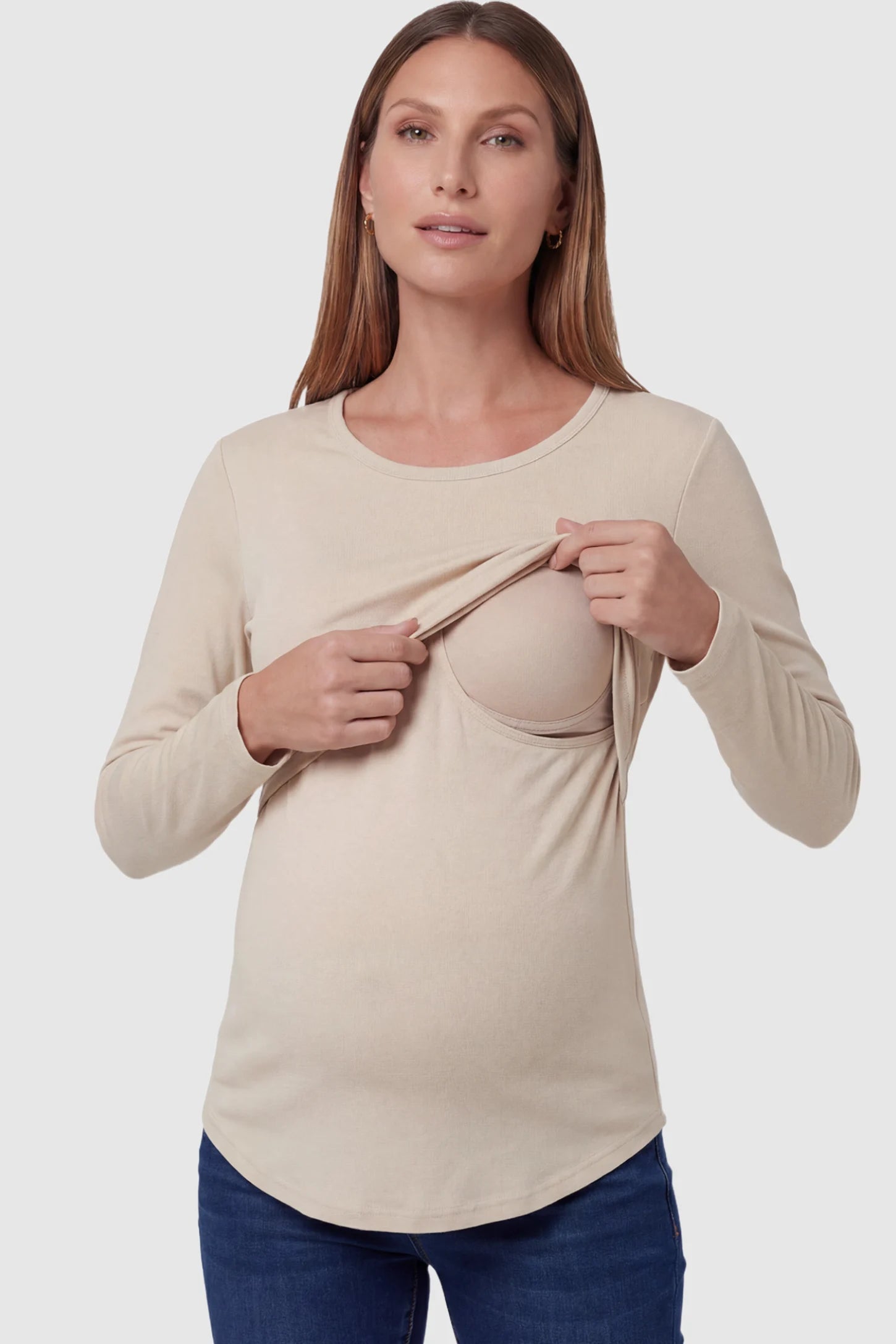 Double Layer Long Sleeve Maternity Nursing Top Double Layer Long Sleeve Maternity & Nursing Top in Apricot with a discrete lift-up access on a pregnant model.