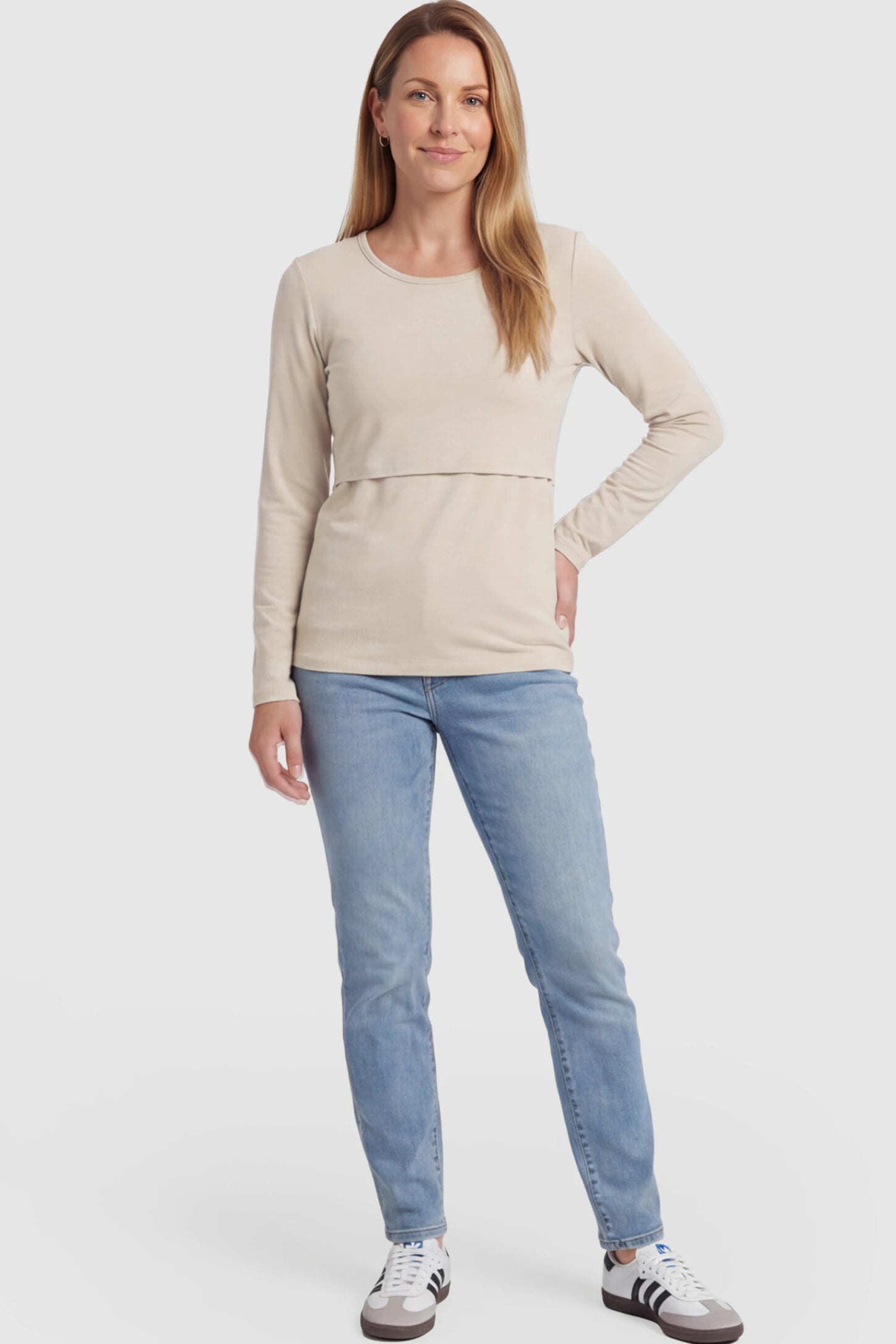 Double Layer Long Sleeve Maternity Nursing Top Double Layer Long Sleeve Maternity & Nursing Top in Apricot with a discrete lift-up access on a postpartum model.