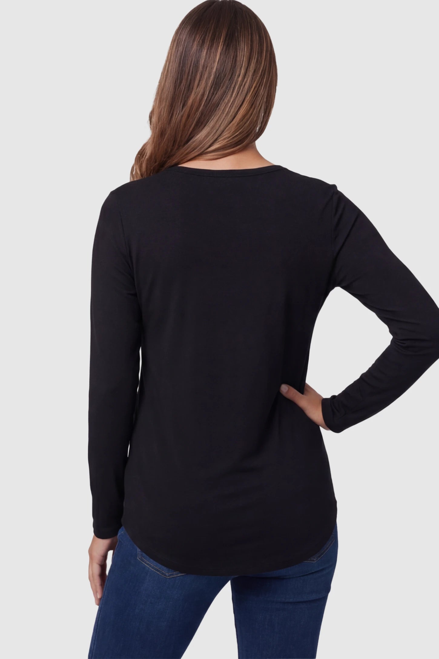 Double Layer Long Sleeve Maternity Nursing Top Double Layer Long Sleeve Maternity & Nursing Top in black with a discrete lift-up access on a pregnant model showing back.