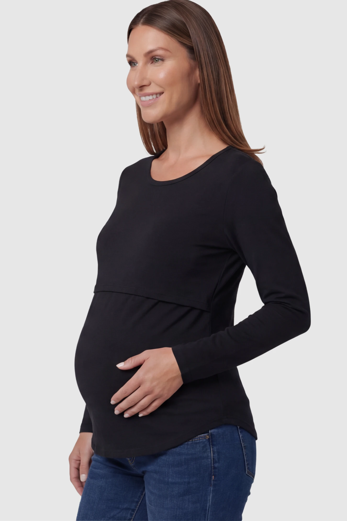 Double Layer Long Sleeve Maternity Nursing Top Double Layer Long Sleeve Maternity & Nursing Top in black with a discrete lift-up access on a pregnant model showing side.