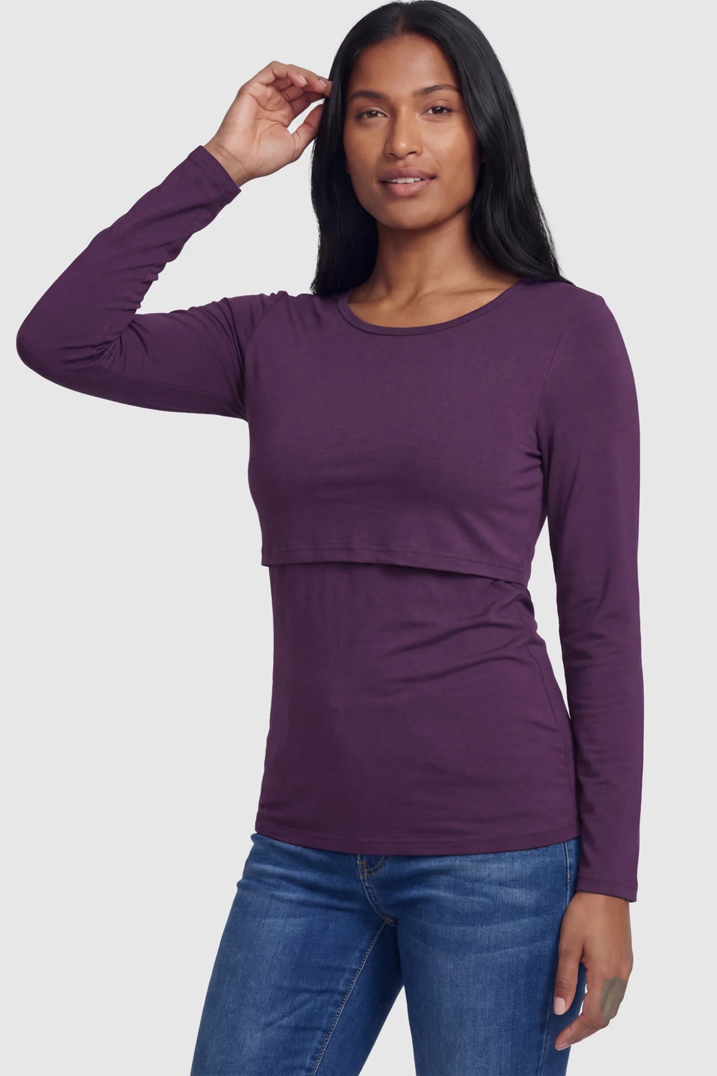Double Layer Long Sleeve Maternity Nursing Top Double Layer Long Sleeve Maternity & Nursing Top in dark purple with a discrete lift-up access on a postpartum model.