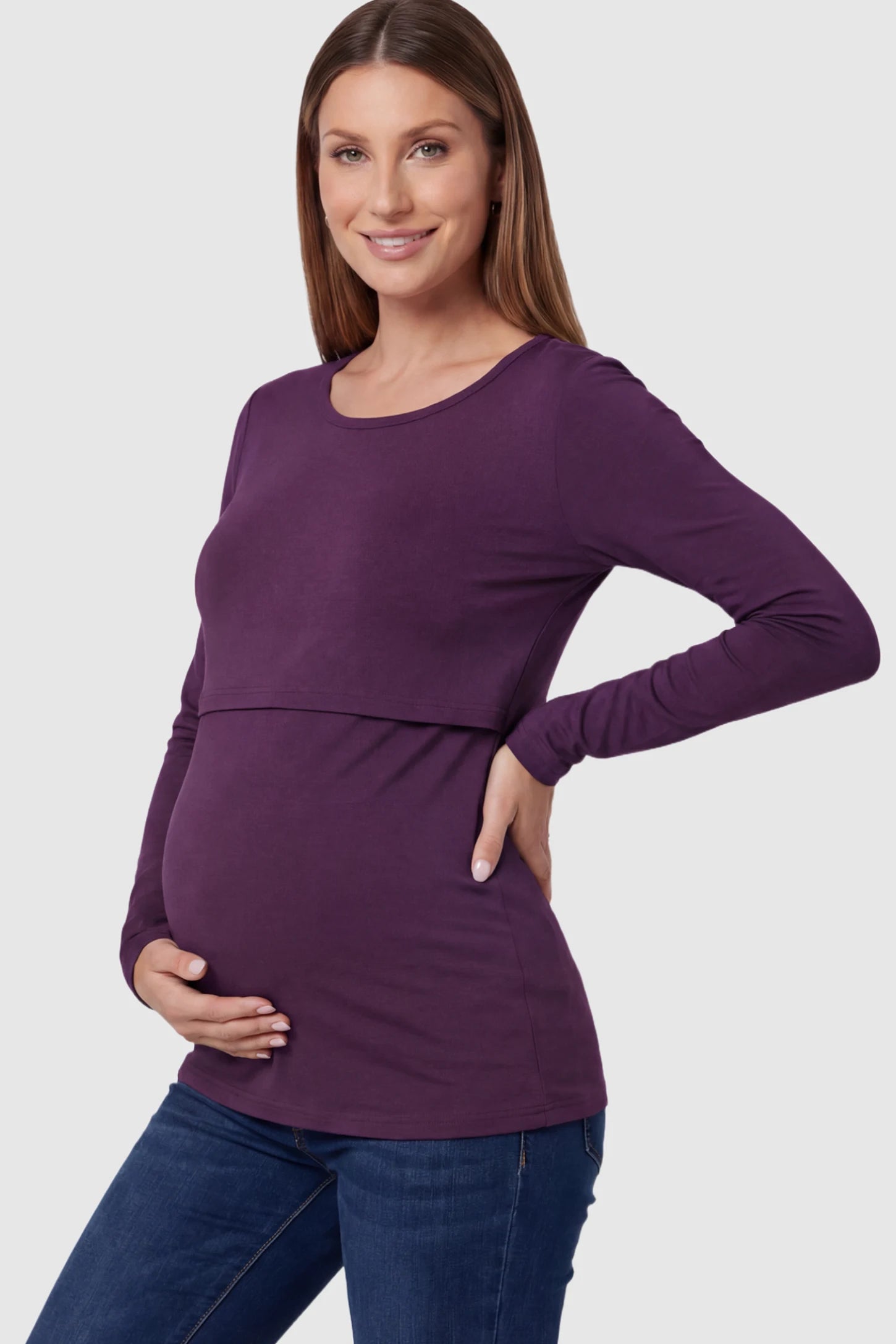 Double Layer Long Sleeve Maternity Nursing Top Double Layer Long Sleeve Maternity & Nursing Top in dark purple with a discrete lift-up access on a pregnant model showing side.