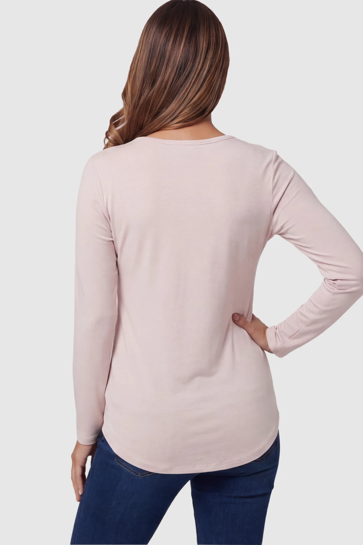 Double Layer Long Sleeve Maternity Nursing Top Double Layer Long Sleeve Maternity & Nursing Top in pink with a discrete lift-up access on a pregnant model showing back.