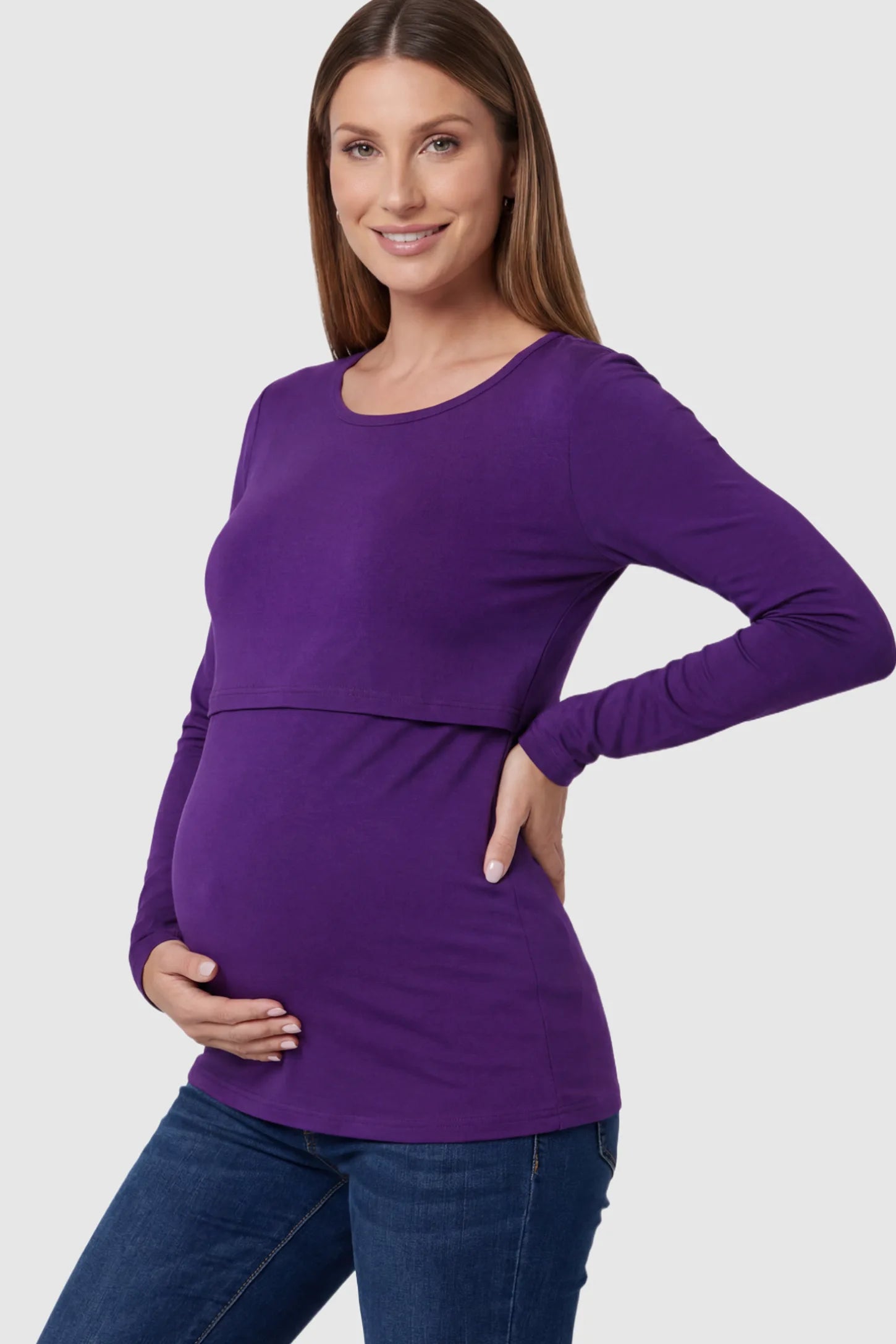 Double Layer Long Sleeve Maternity Nursing Top Double Layer Long Sleeve Maternity & Nursing Top in purple with a discrete lift-up access on a pregnant model showing side.