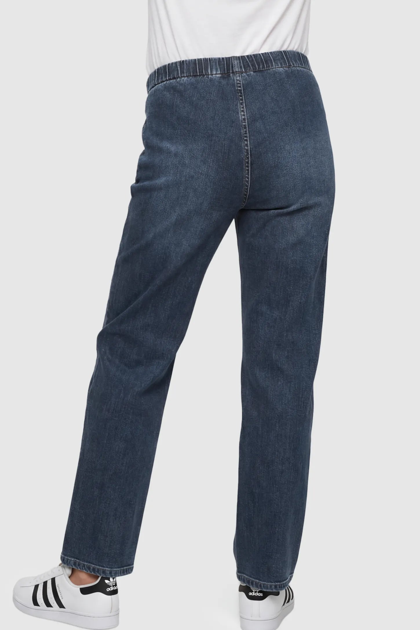 Drawstring Waist Wide Leg Maternity Jeans Drawstring Waist Wide Leg Maternity Jeans in Blue featuring slight stretch on a pregnant model showing back.