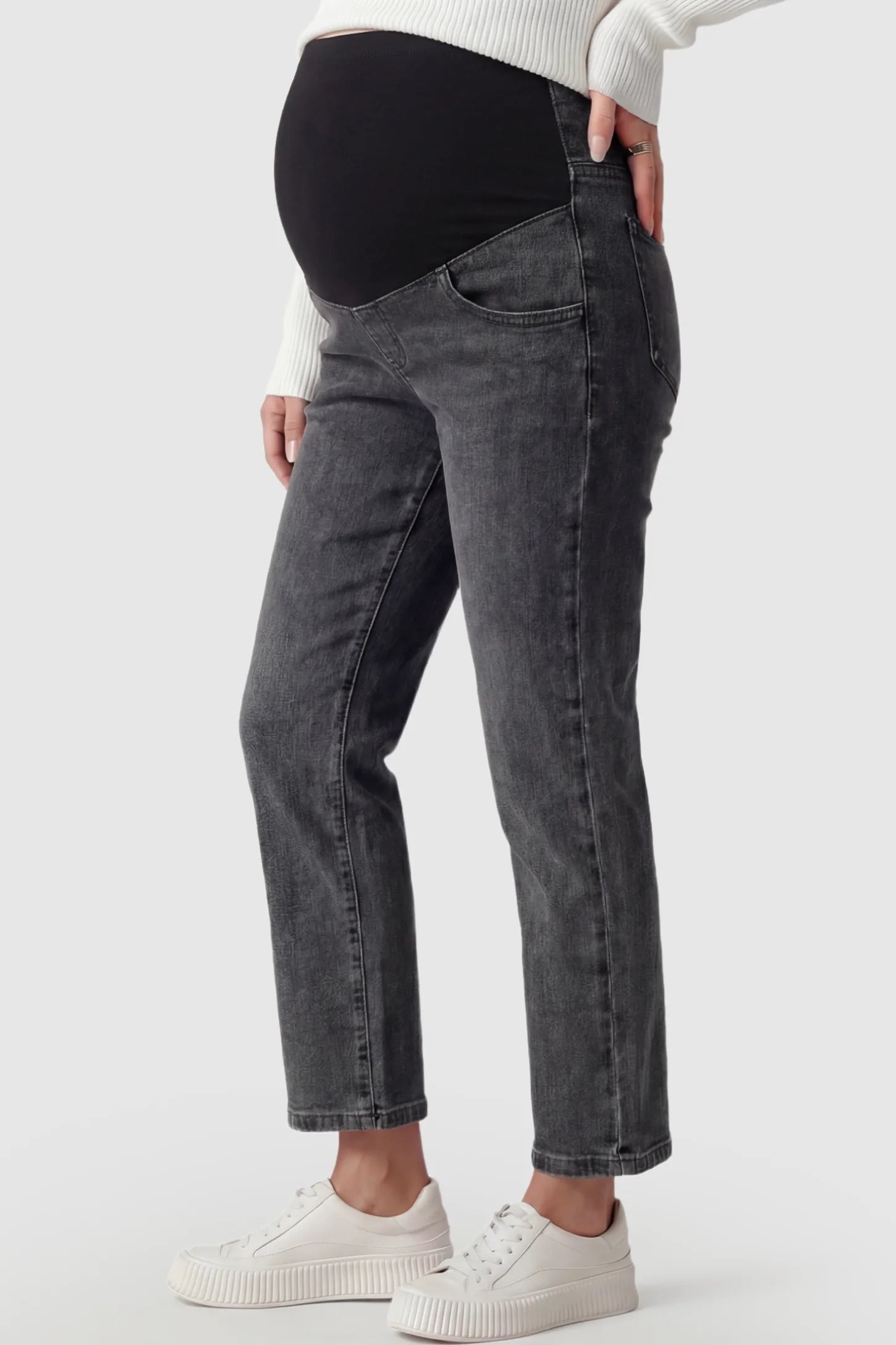 Elastic Full Panel Straight Leg Maternity Jeans Elastic Full Panel Straight Leg Maternity Jeans in smoky Gray featuring a high-stretch jersey waistband on a pregnant model showing side.