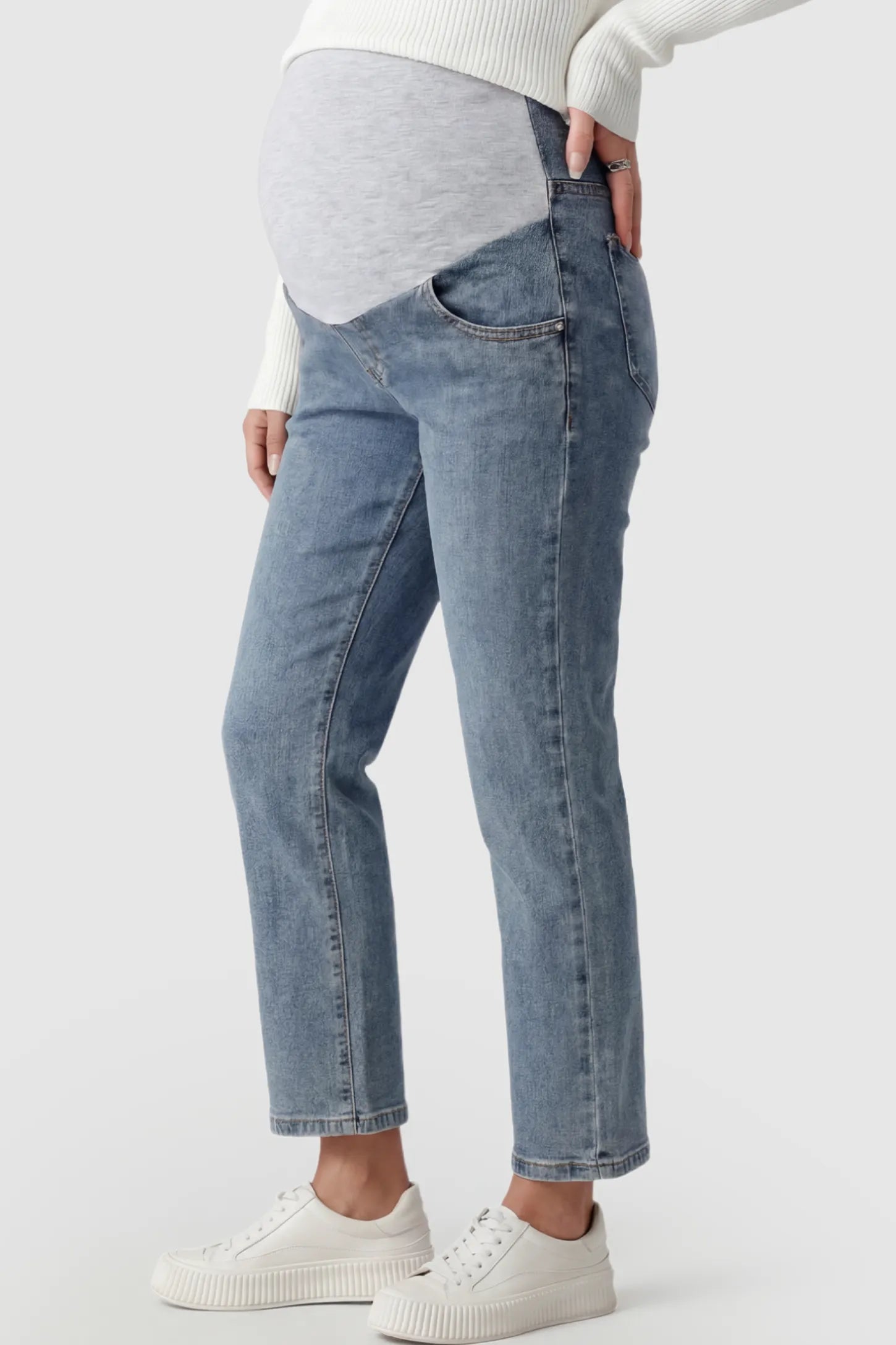 Elastic Full Panel Straight Leg Maternity Jeans Elastic Full Panel Straight Leg Maternity Jeans in Vintage Blue featuring a high-stretch jersey waistband on a pregnant model showing side.