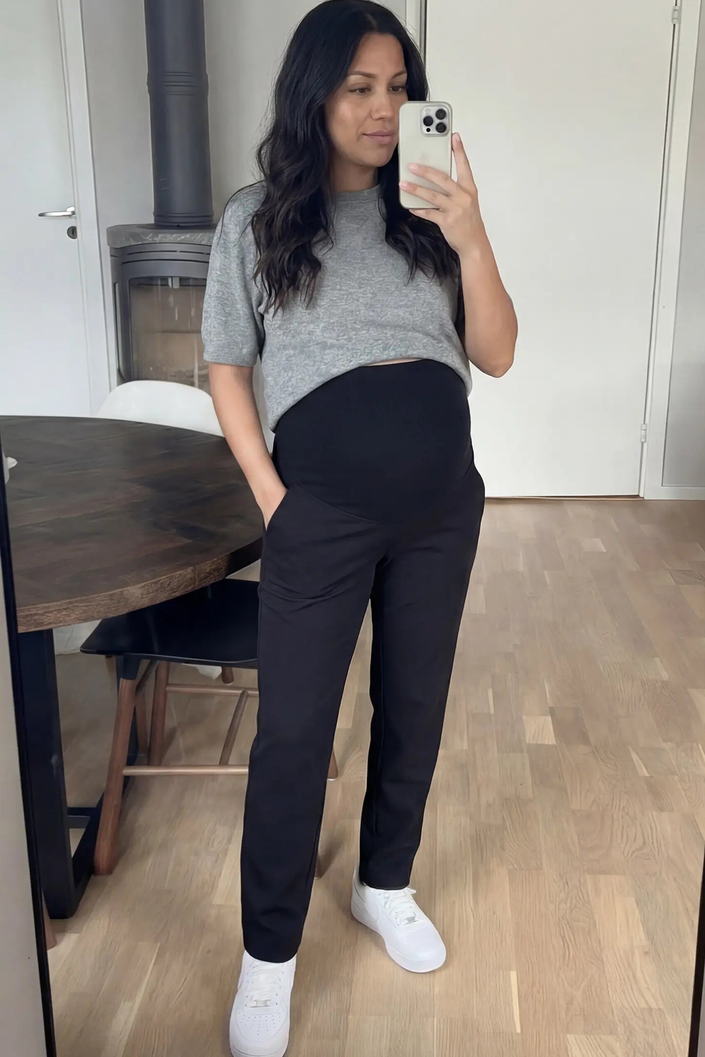 Elastic Mid Waist Straight Leg Maternity Pants Elastic Mid Waist Straight Leg Maternity Pants in black featuring Elastic Waistband on a pregnant woman showing front.