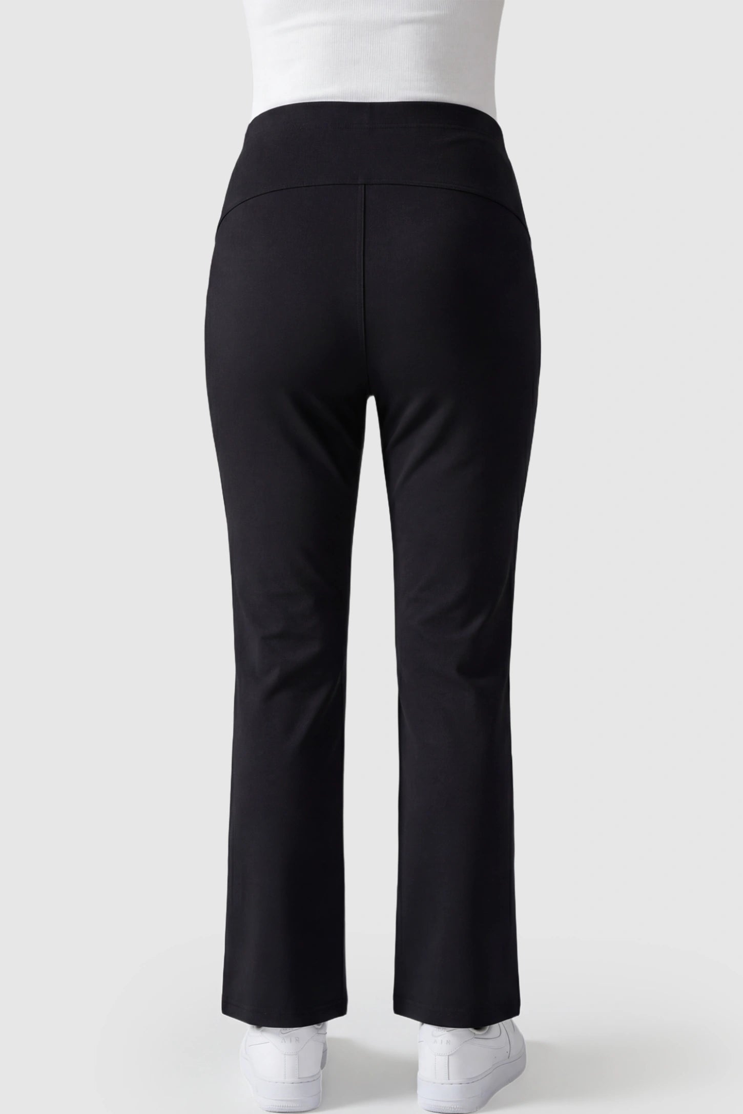 Elastic Mid Waist Straight Leg Maternity Pants Elastic Mid Waist Straight Leg Maternity Pants in black featuring long-lasting superior fabric on a pregnant model showing back.