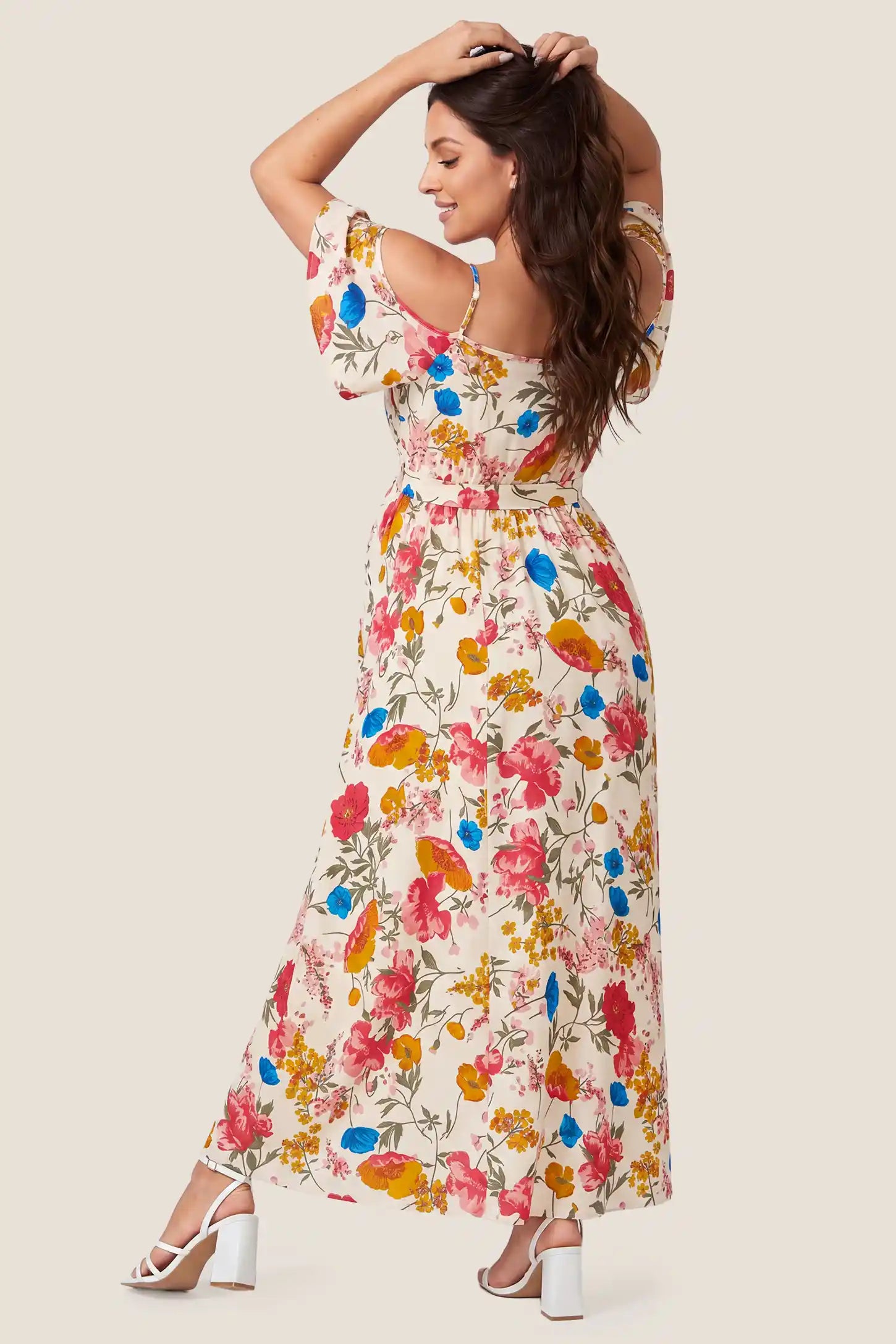 Elegant Floral Cold Shoulder Maternity Maxi Dress with Slit Elegant Floral Cold Shoulder Maternity Maxi Dress with Slit in Khaki showing back floral pattern, back view on a pregnant model.