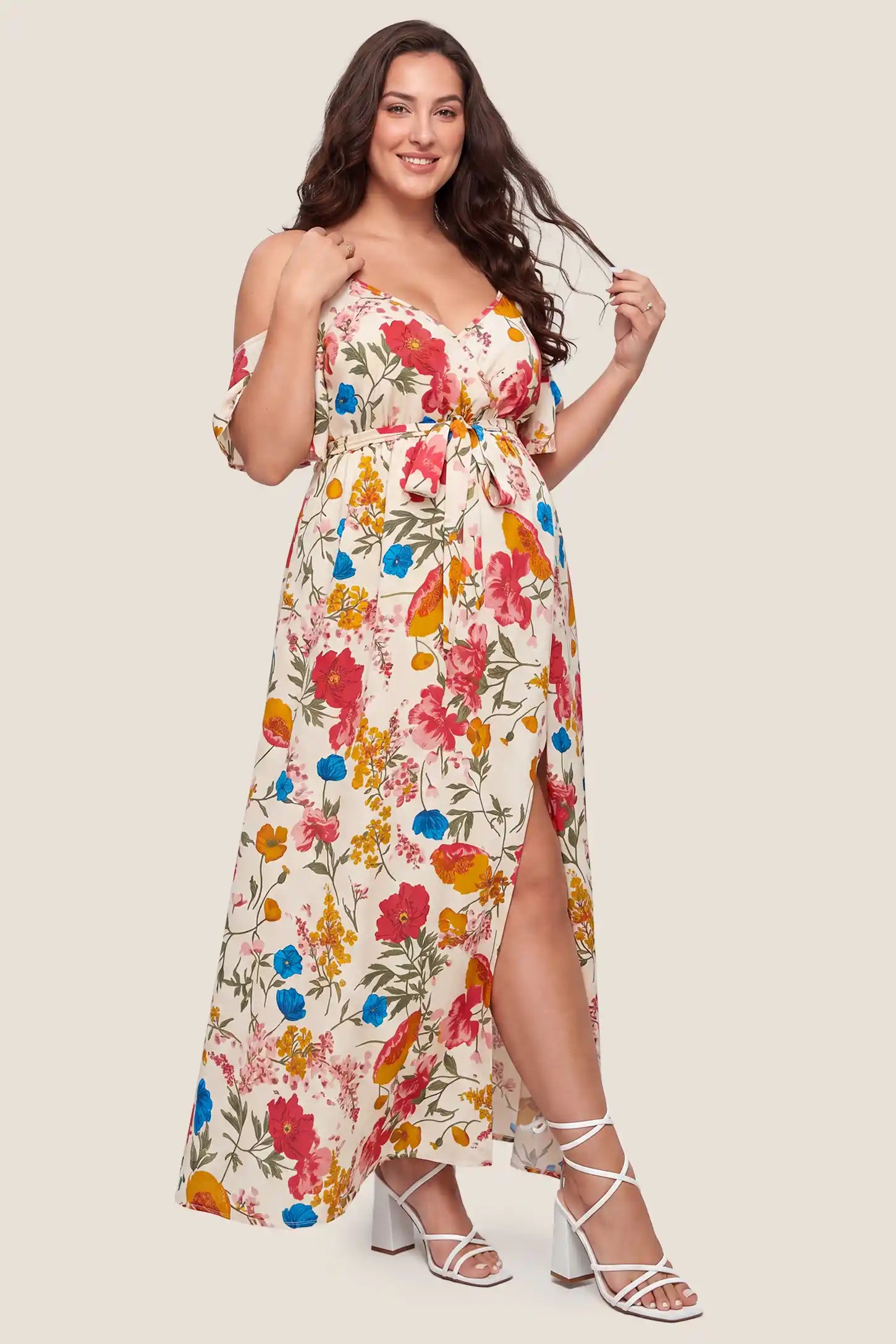 Elegant Floral Cold Shoulder Maternity Maxi Dress with Slit in Khaki with floral design and a flattering front slit, front view on a plus-size model.