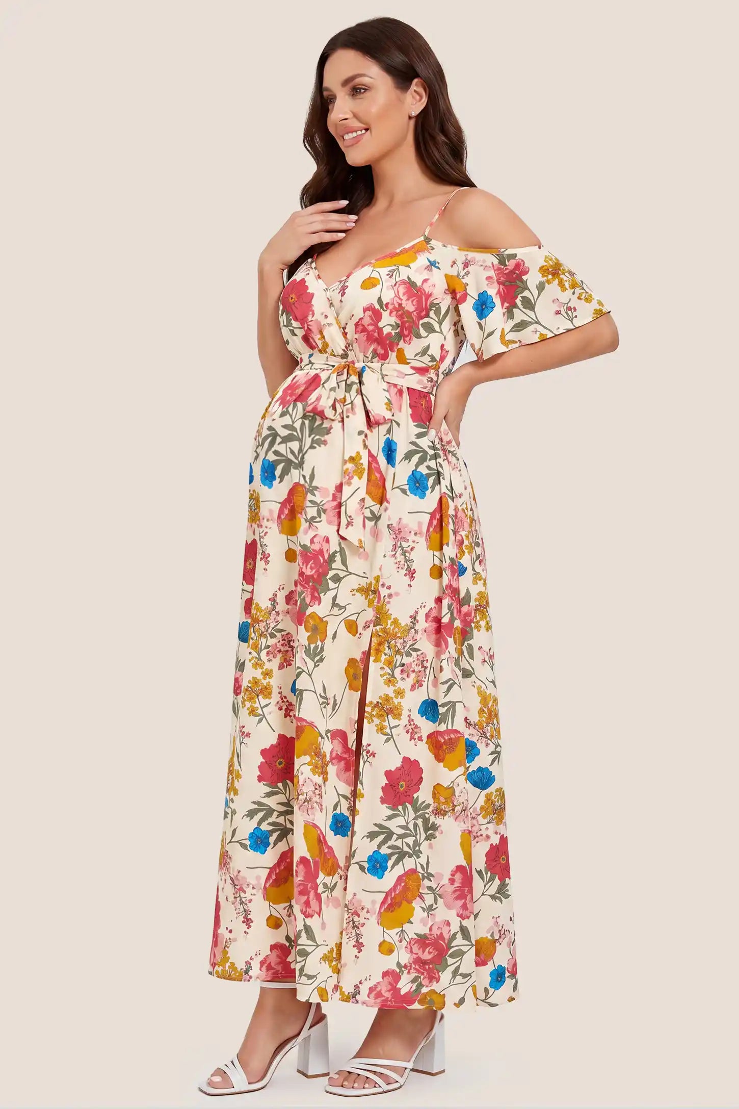 Elegant Floral Cold Shoulder Maternity Maxi Dress with Slit Elegant Floral Cold Shoulder Maternity Maxi Dress with Slit in Khaki with cold shoulder cutouts and a side slit, side view on a pregnant model.