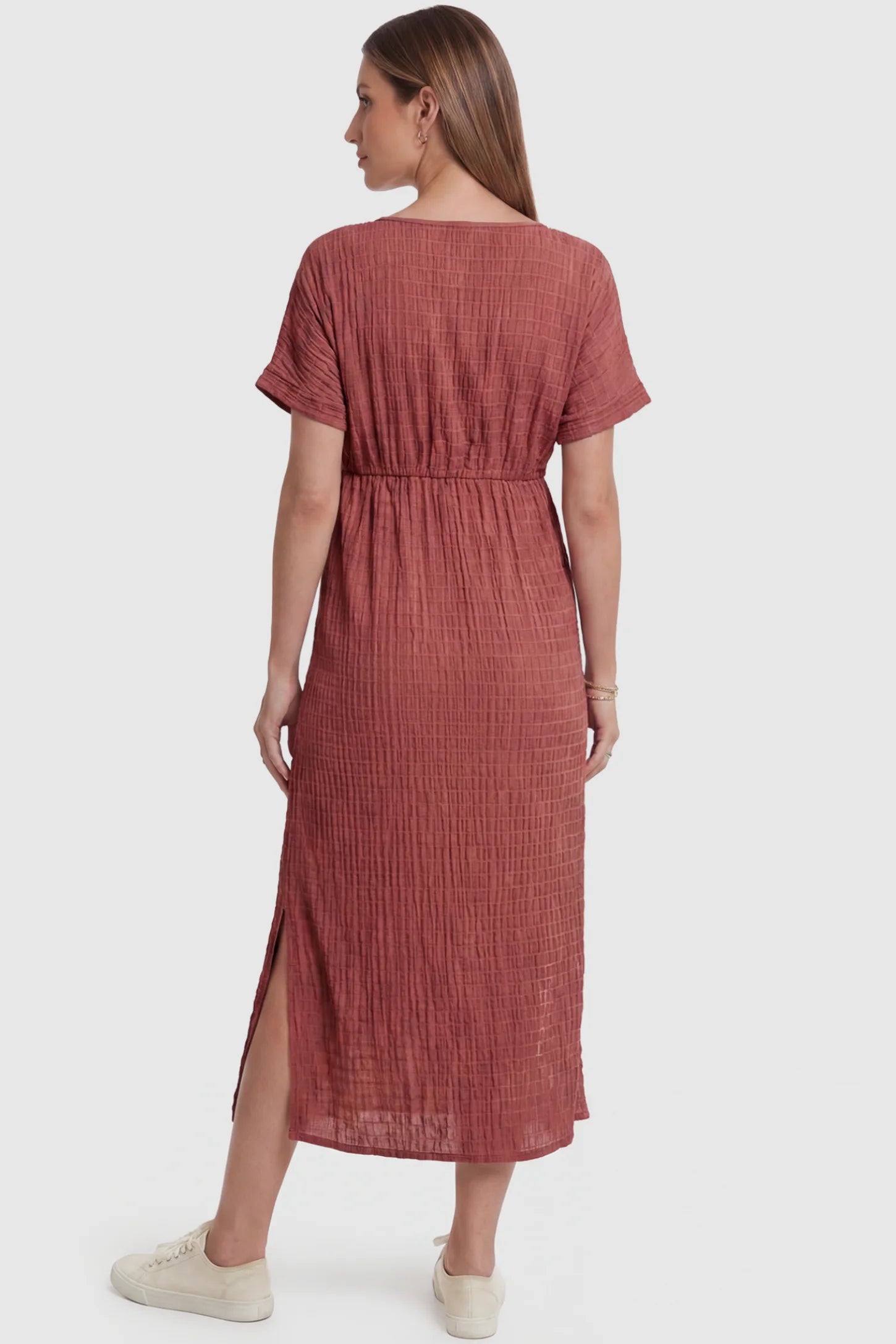 Empire Waist Round Neck Maternity Midi Dress Empire Waist Round Neck Maternity Midi Dress in Wine Red featuring empire waist and short sleeves on a pregnant model, back view.