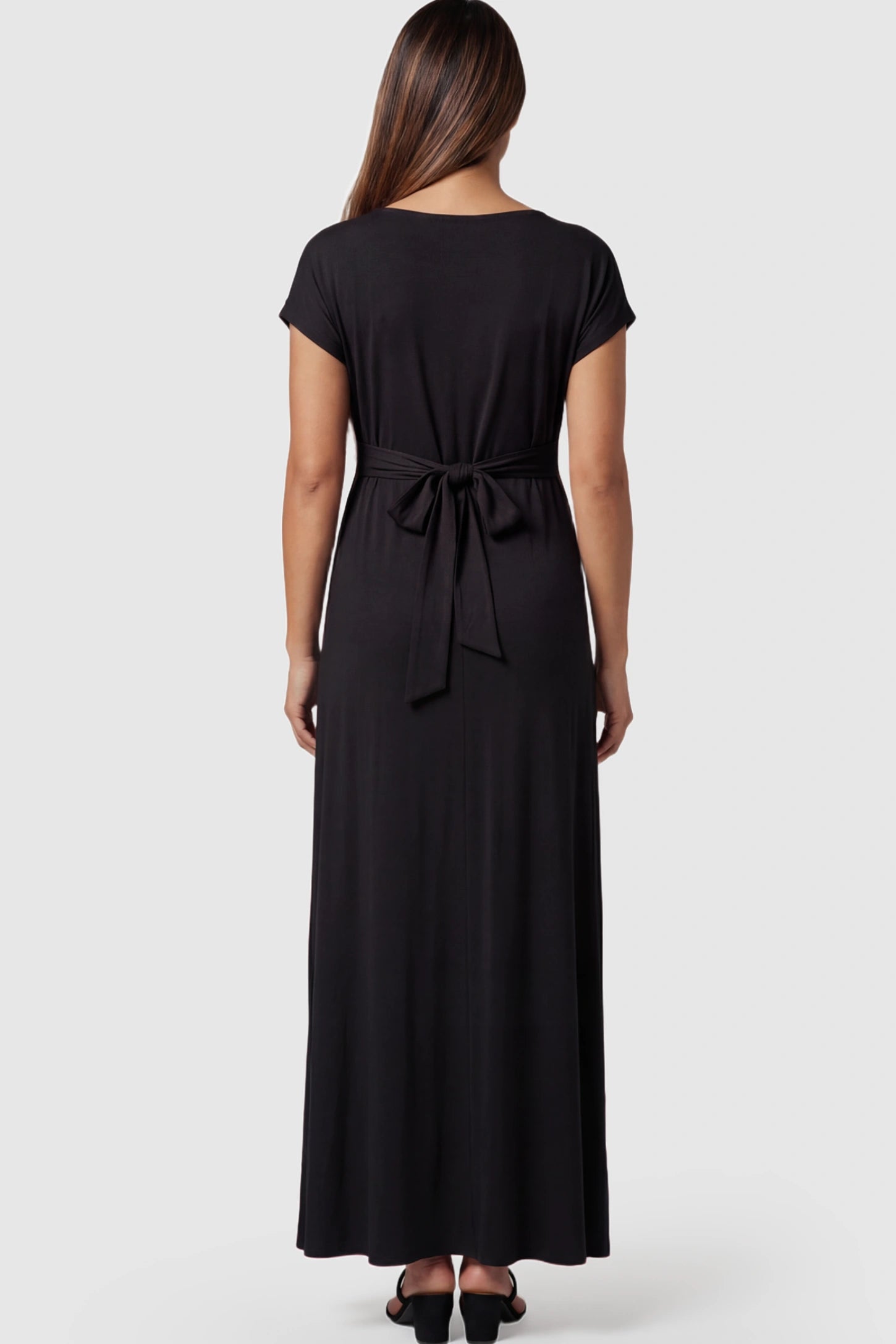 Empire Waist Short Sleeve Maternity Nursing Maxi Dress Empire Waist Short Sleeve Maternity Nursing Maxi Dress featuring tie back detail in black on a pregnant model showing back.