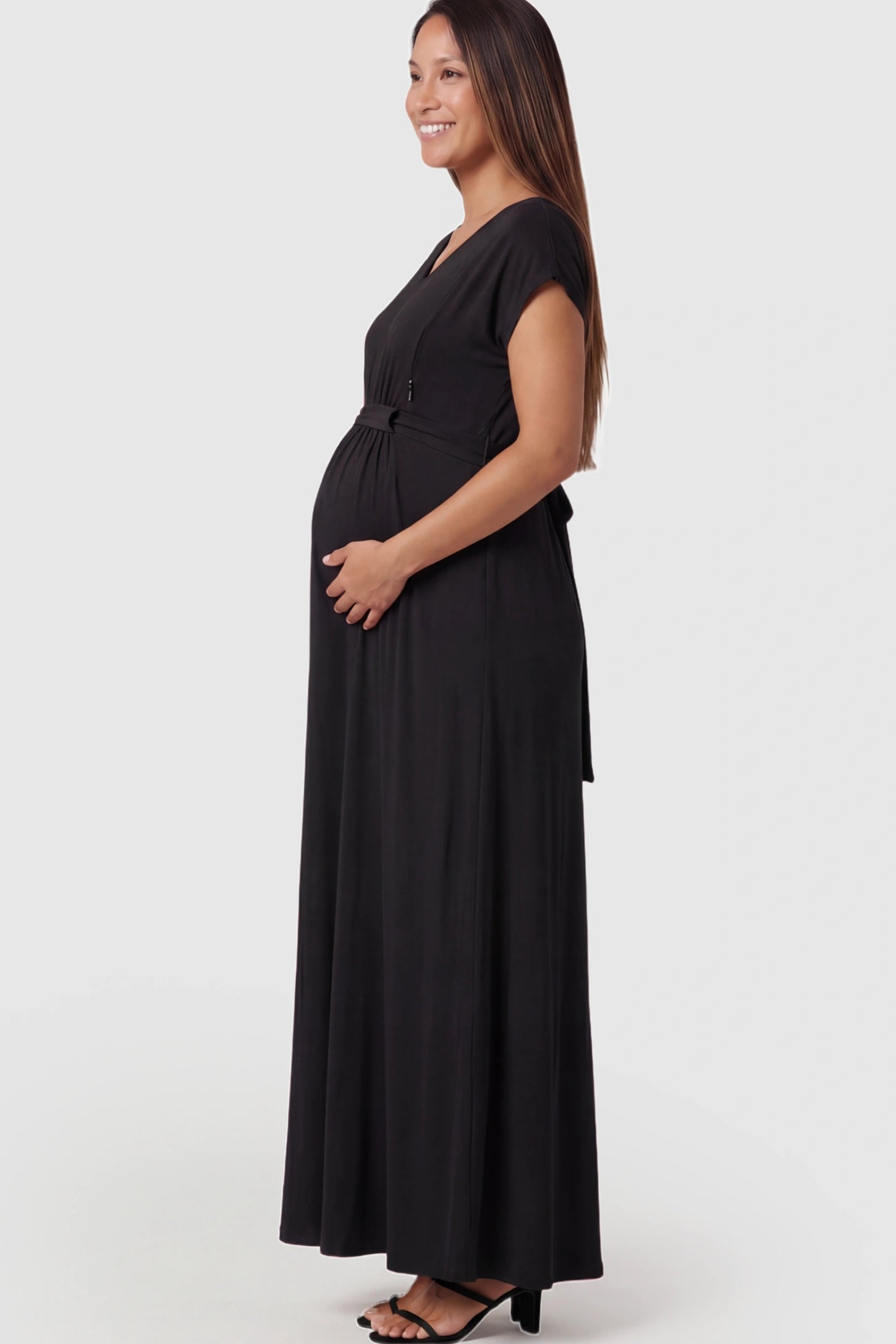 Empire Waist Short Sleeve Maternity Nursing Maxi Dress Empire Waist Short Sleeve Maternity Nursing Maxi Dress featuring hidden breastfeeding zippers in black on a pregnant model showing side.