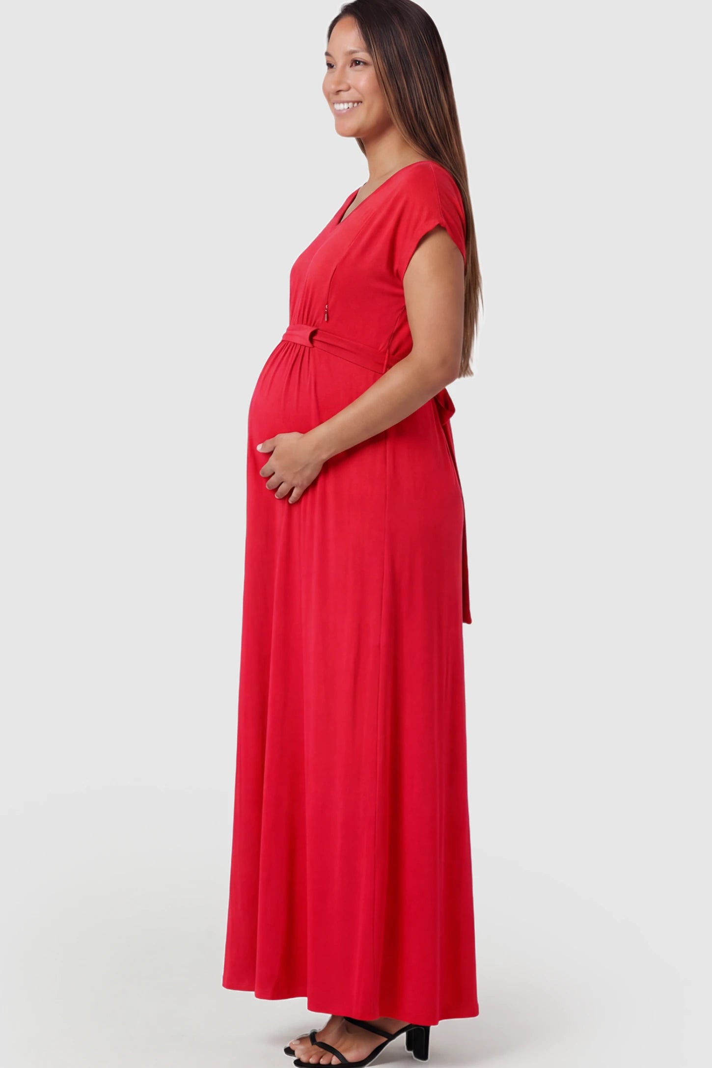Empire Waist Short Sleeve Maternity Nursing Maxi Dress Empire Waist Short Sleeve Maternity Nursing Maxi Dress featuring hidden breastfeeding zippers in red on a pregnant model showing side.
