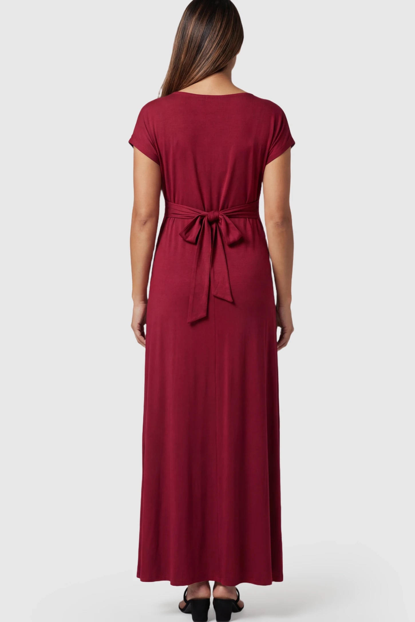 Empire Waist Short Sleeve Maternity Nursing Maxi Dress Empire Waist Short Sleeve Maternity Nursing Maxi Dress featuring tie back detail in wine red on a pregnant model showing back.