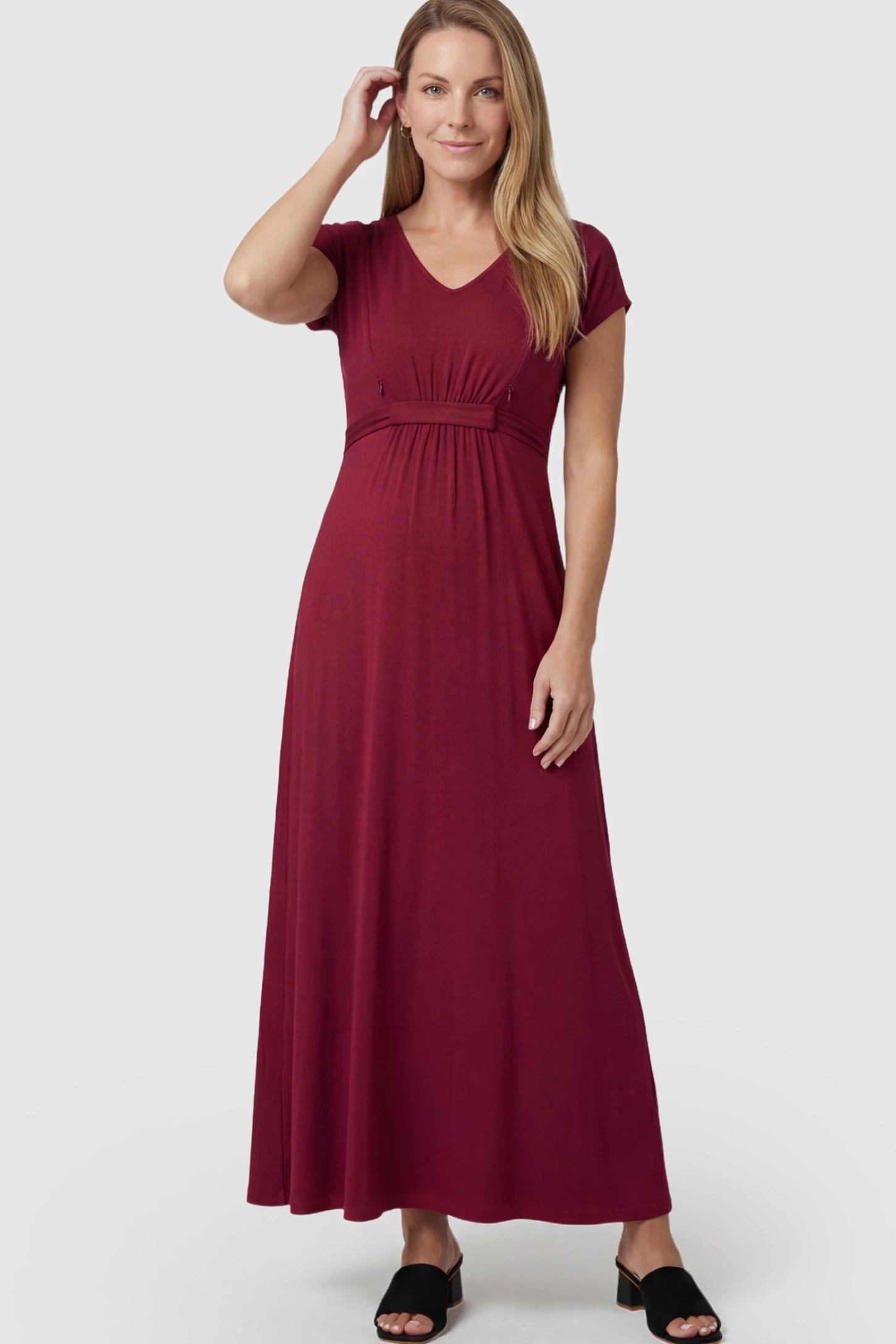 Empire Waist Short Sleeve Maternity Nursing Maxi Dress Empire Waist Short Sleeve Maternity Nursing Maxi Dress featuring hidden breastfeeding zippers in wine red on a postpartum model showing front.