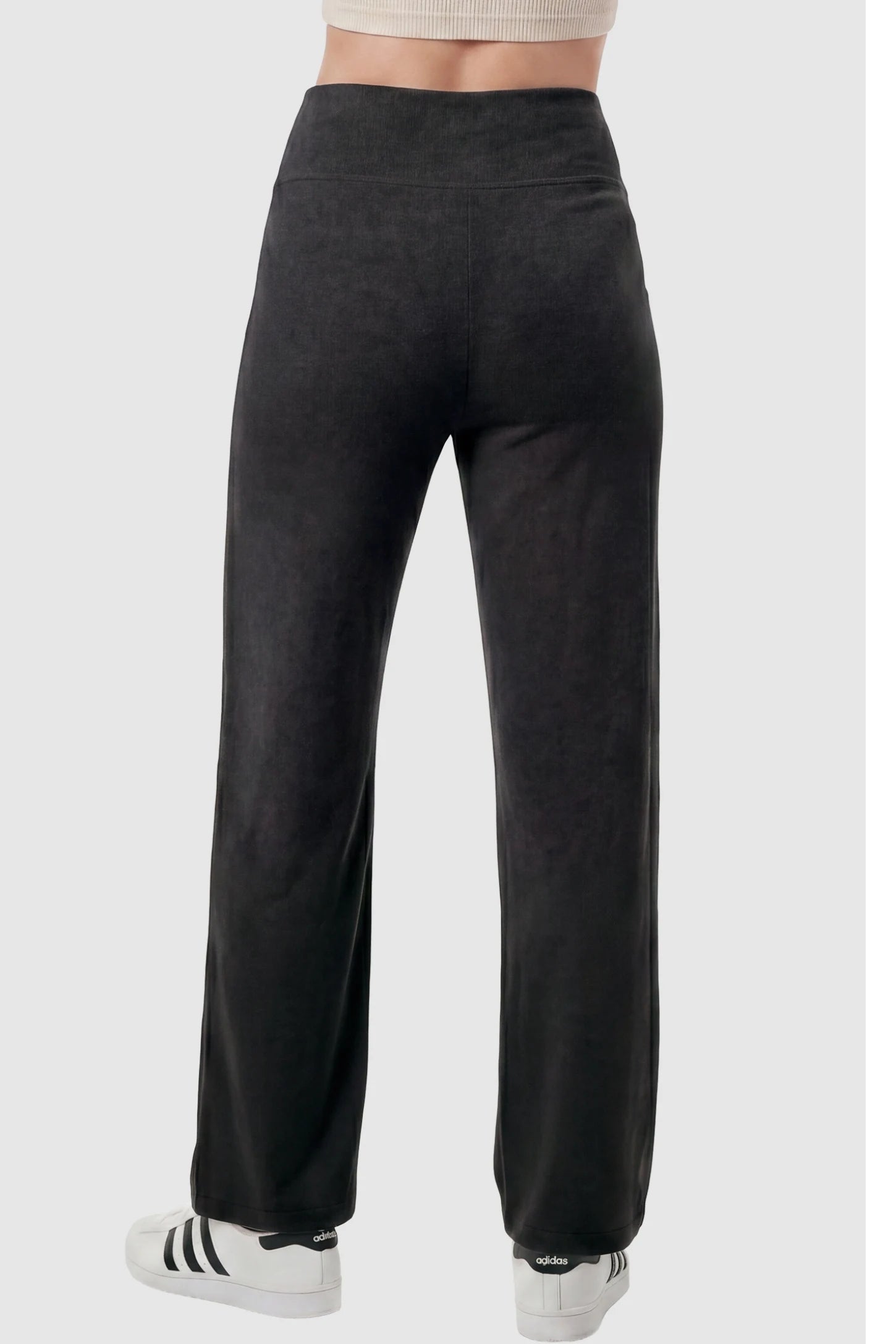 Fleece Straight-Leg Maternity Pants Fleece Straight-Leg Maternity Pants in Black featuring a smooth, cozy finish on a pregnant model, back view.