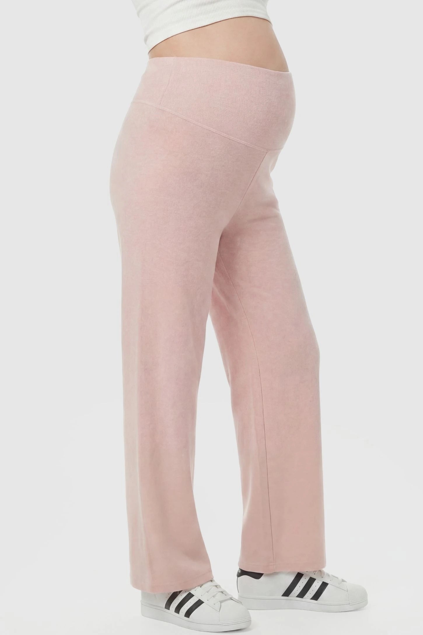 Fleece Straight-Leg Maternity Pants Fleece Straight-Leg Maternity Pants in Pink featuring a relaxed straight-leg cut on a pregnant model, side view.