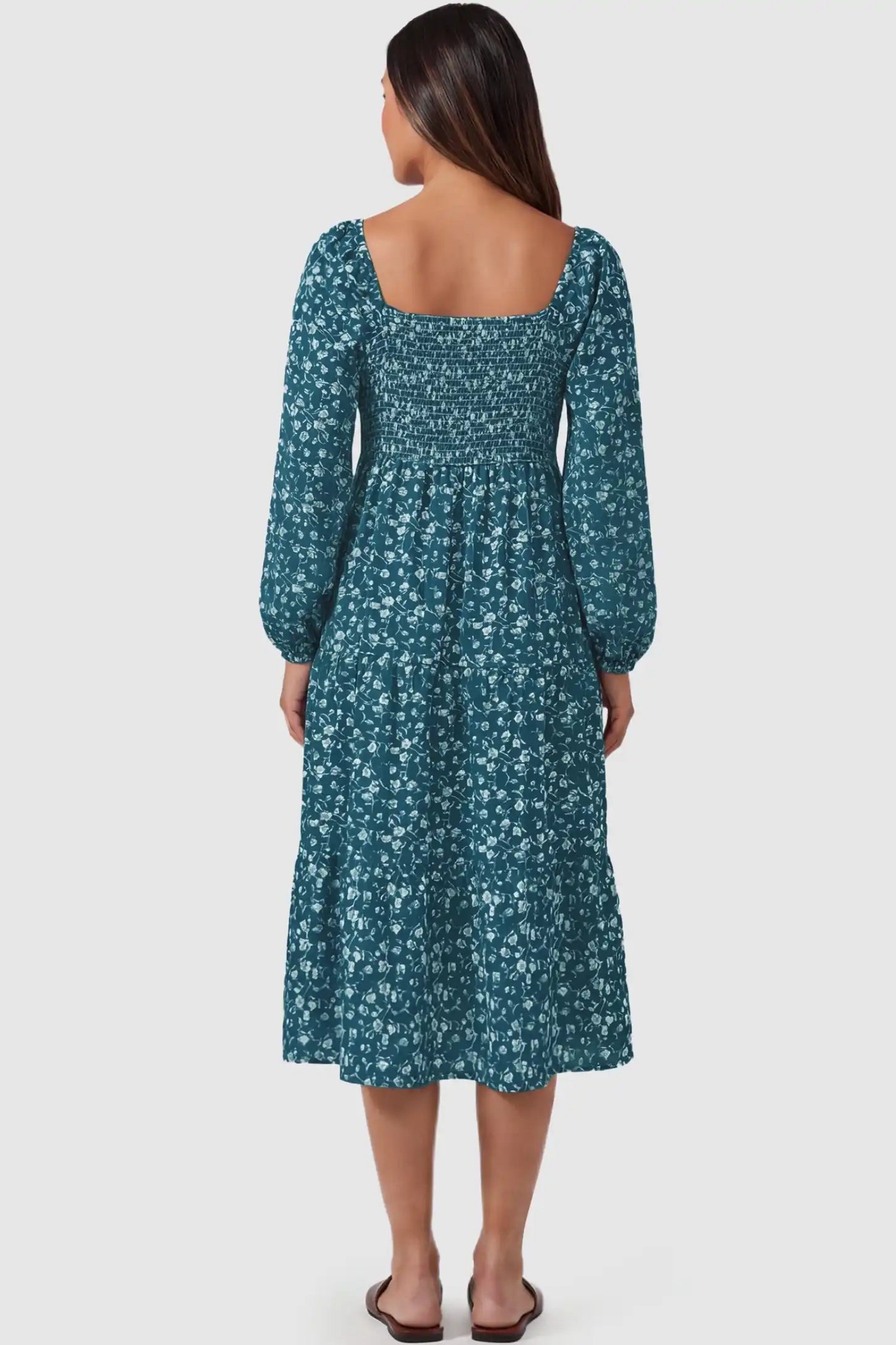 Floral Balloon Sleeves Midi Maternity Dress Floral Balloon Sleeves Midi Maternity Dress in Blue featuring a smocked back on a rear-view pregnant model.