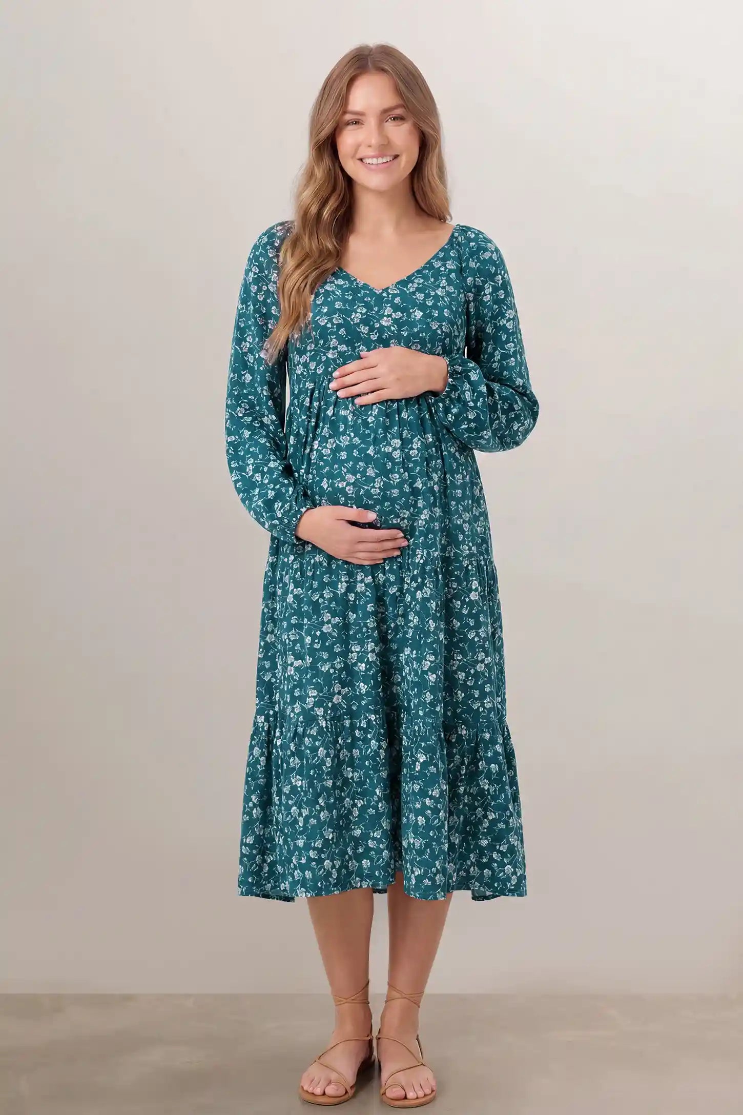 Floral Balloon Sleeves Midi Maternity Dress in Blue featuring a V-neckline on a front-facing pregnant model.