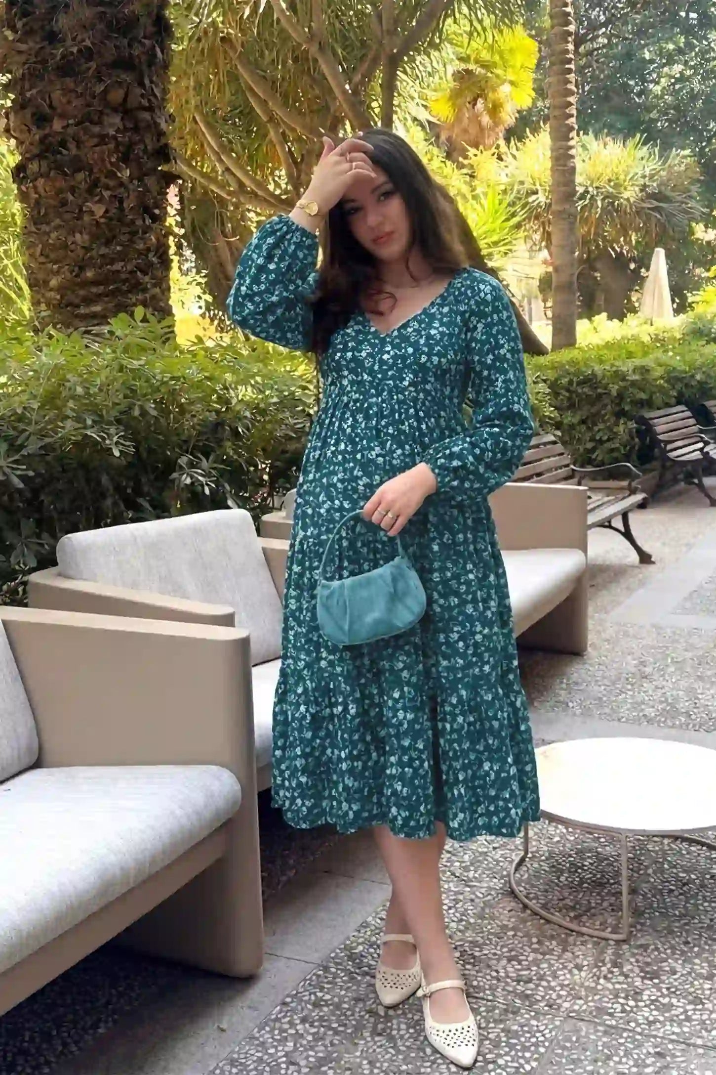 Floral Balloon Sleeves Midi Maternity Dress Blue Floral Balloon Sleeves Midi Maternity Dress featuring a tiered skirt on a front view pregnant model, UGC view.