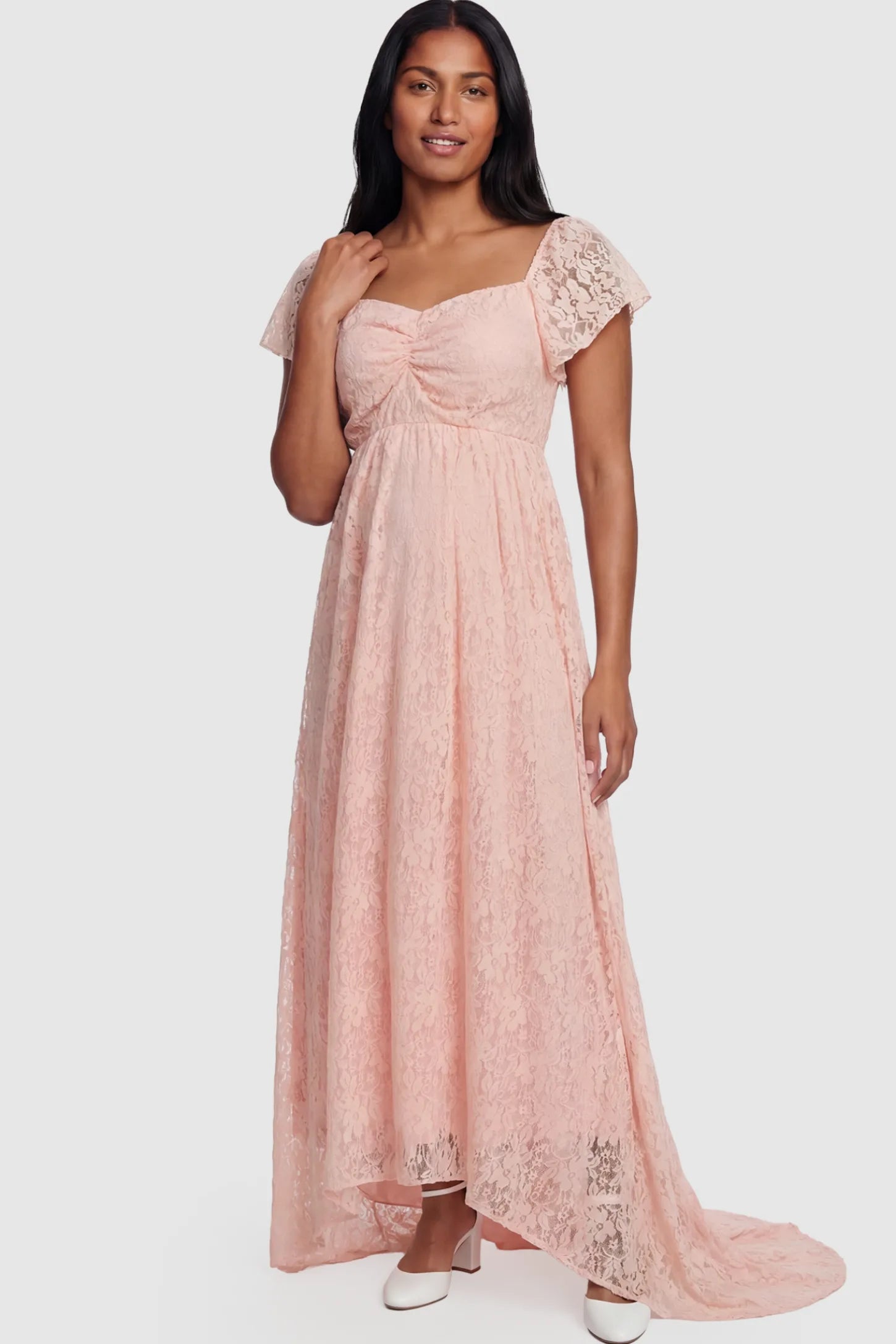 Floral Lace Flutter Sleeve Maternity Maxi Dress Floral Lace Flutter Sleeve Maternity Maxi Dress in Pink featuring sweetheart neckline on a postpartum model showing front.