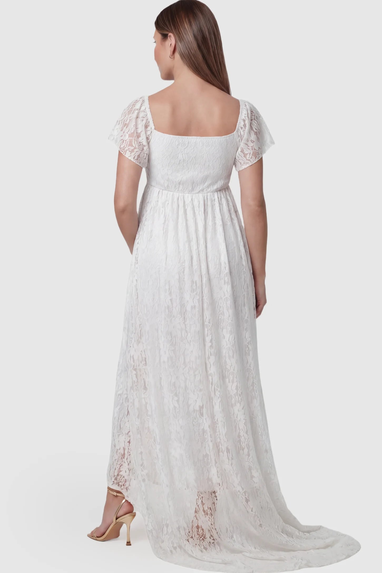 Floral Lace Flutter Sleeve Maternity Maxi Dress Floral Lace Flutter Sleeve Maternity Maxi Dress in White featuring floor-sweeping silhouette on a pregnant model showing back.