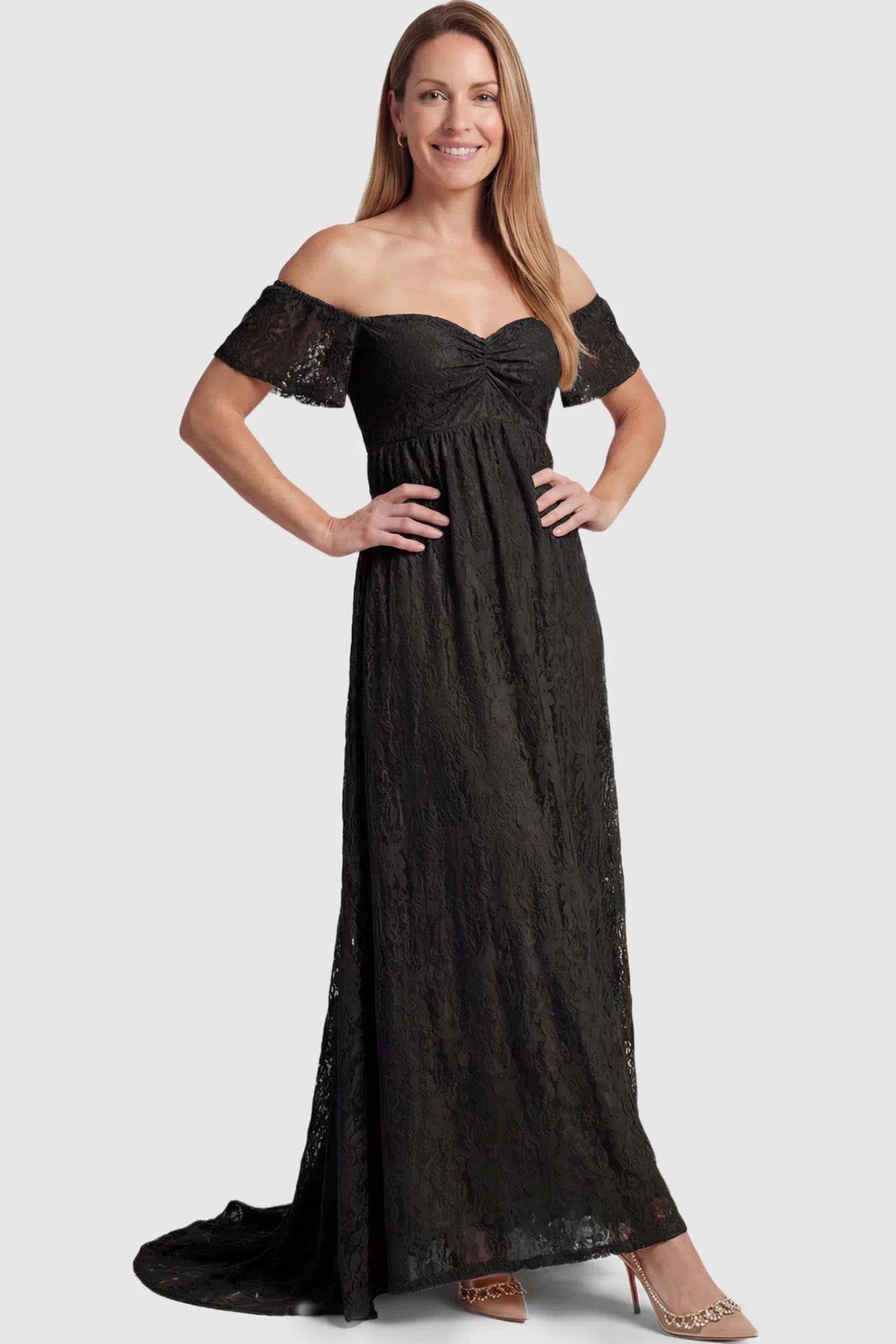 Lace Off Shoulder Maternity Maxi Dress Lace Off Shoulder Maternity Maxi Dress in Black featuring off the shoulder neckline on a postpartum model showing front.