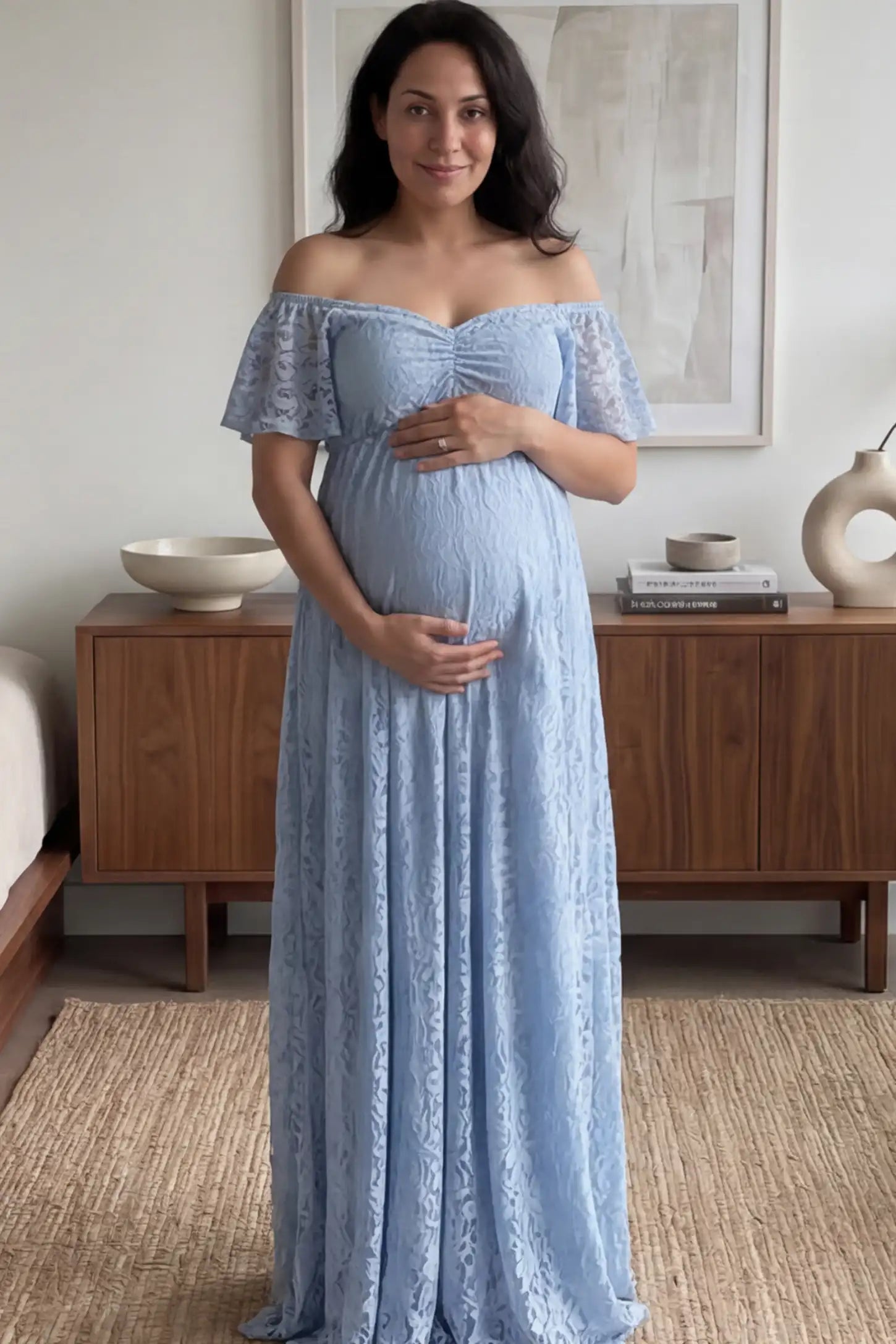Lace Off Shoulder Maternity Maxi Dress Lace Off Shoulder Maternity Maxi Dress in light blue featuring off the shoulder neckline on a pregnant woman showing front.