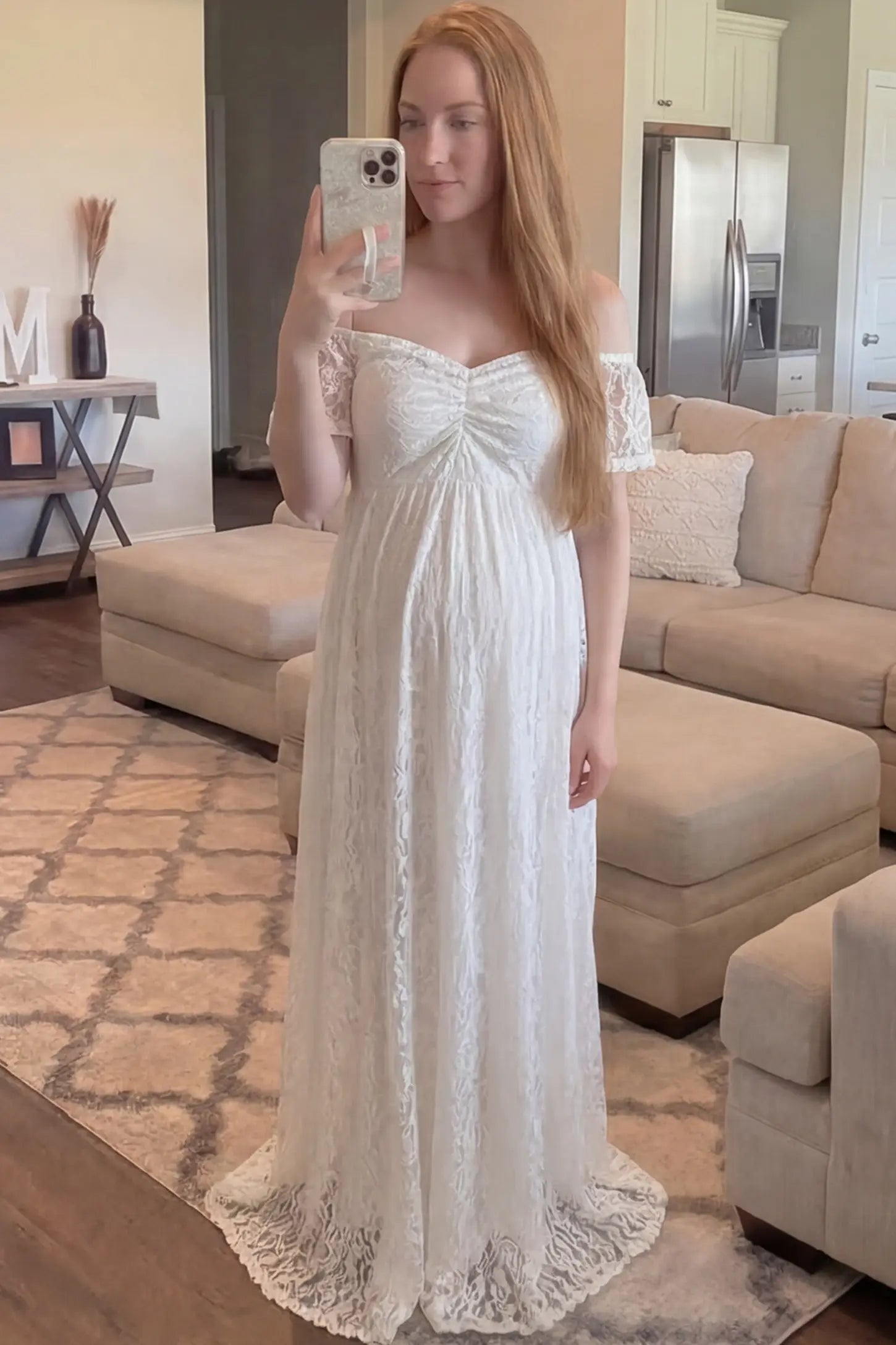 Lace Off Shoulder Maternity Maxi Dress Lace Off Shoulder Maternity Maxi Dress in white featuring off the shoulder neckline on a pregnant woman showing front.