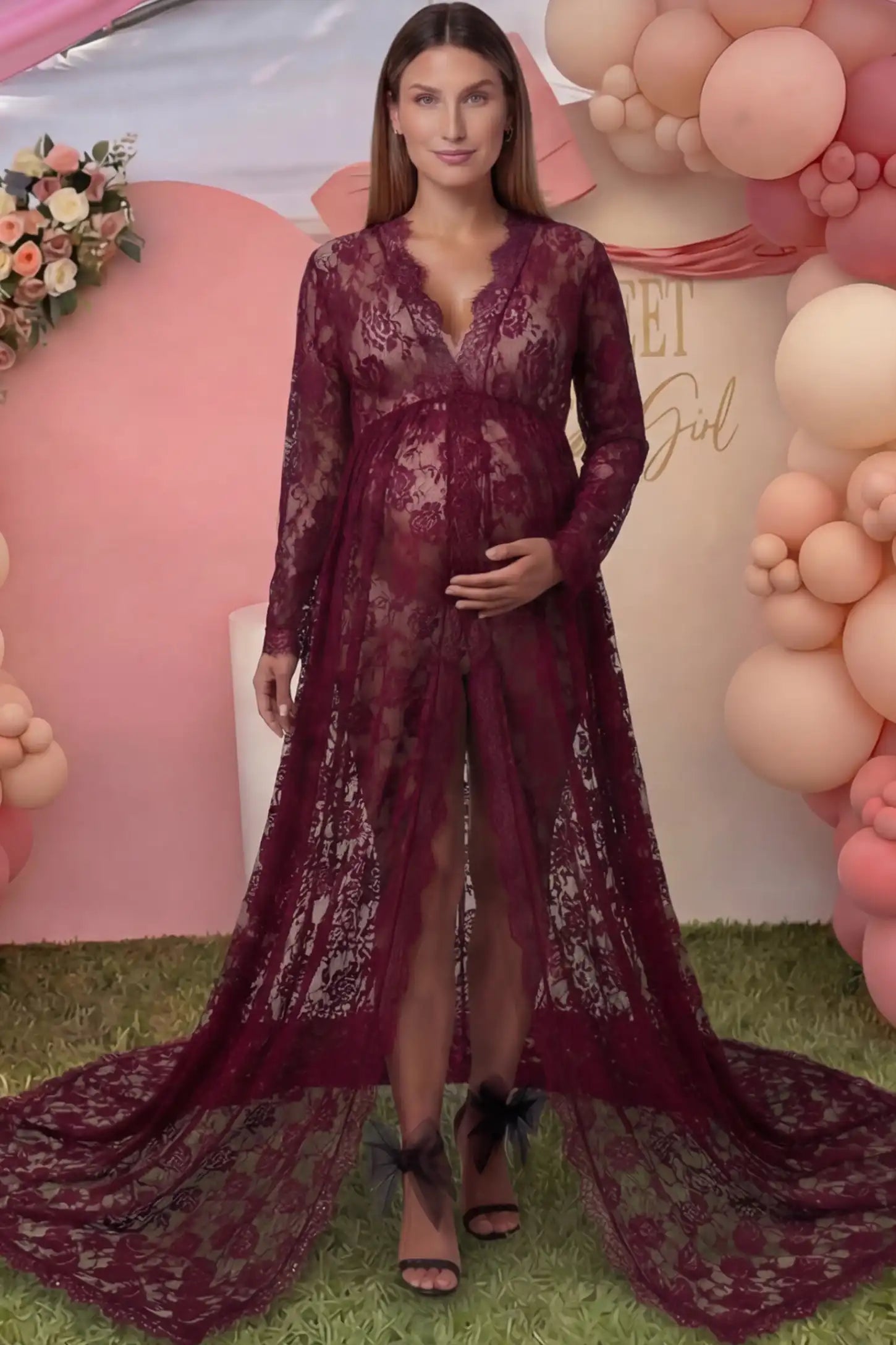 Floral Lace V-Neck Long Sleeve Maternity Photoshoot Gown Floral Lace V-Neck Long Sleeve Maternity Photoshoot Gown in Burgundy featuring long sleeves and high front slit on a pregnant model posing front.