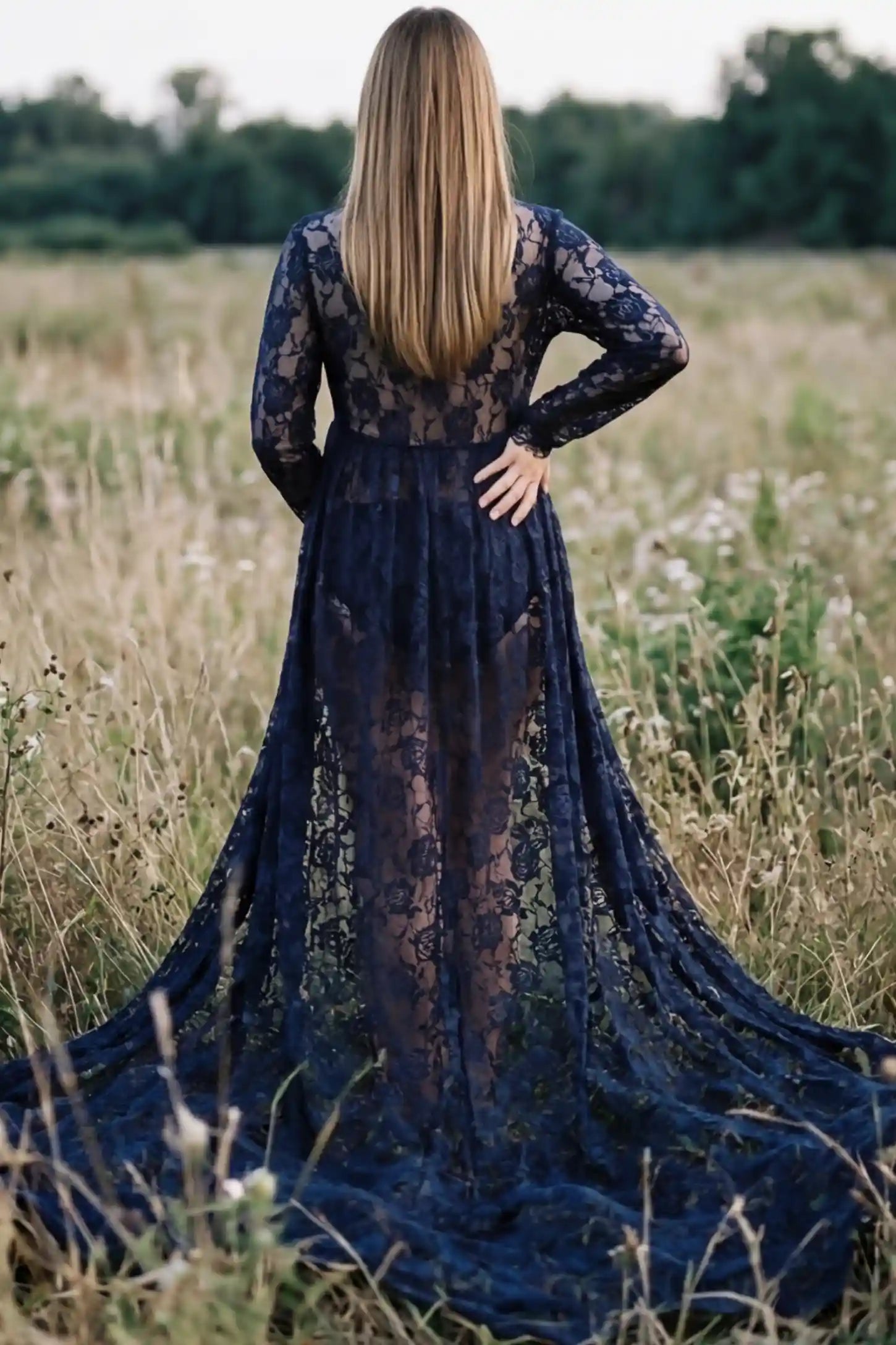Floral Lace V-Neck Long Sleeve Maternity Photoshoot Gown Floral Lace V-Neck Long Sleeve Maternity Photoshoot Gown in Navy Blue featuring floor-length lace train on a pregnant model showing back.