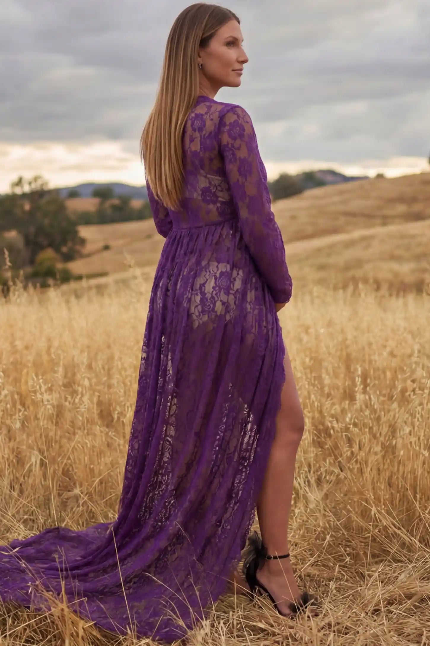 Floral Lace V-Neck Long Sleeve Maternity Photoshoot Gown Floral Lace V-Neck Long Sleeve Maternity Photoshoot Gown in Purple featuring floor-length lace train on a pregnant model showing back.