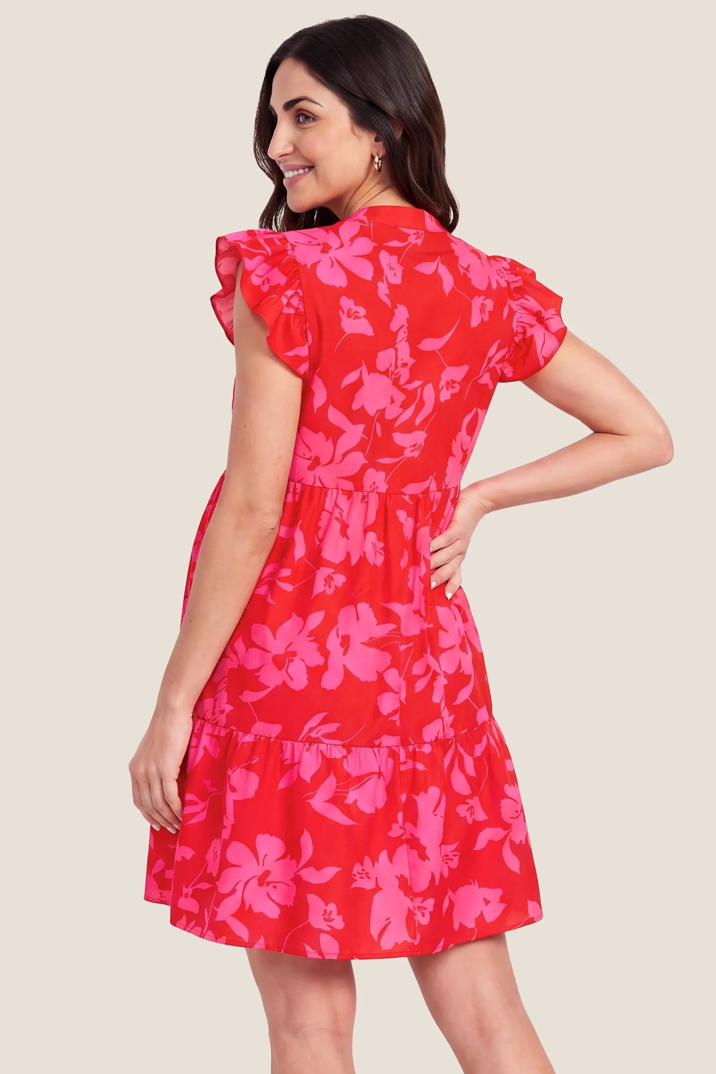 Floral Print V-Neck Flutter Sleeve Maternity Short Dress Floral Print V-Neck Flutter Sleeve Maternity Short Dress in Poppy Red showcasing the flutter sleeve drape, back view on a pregnant model.