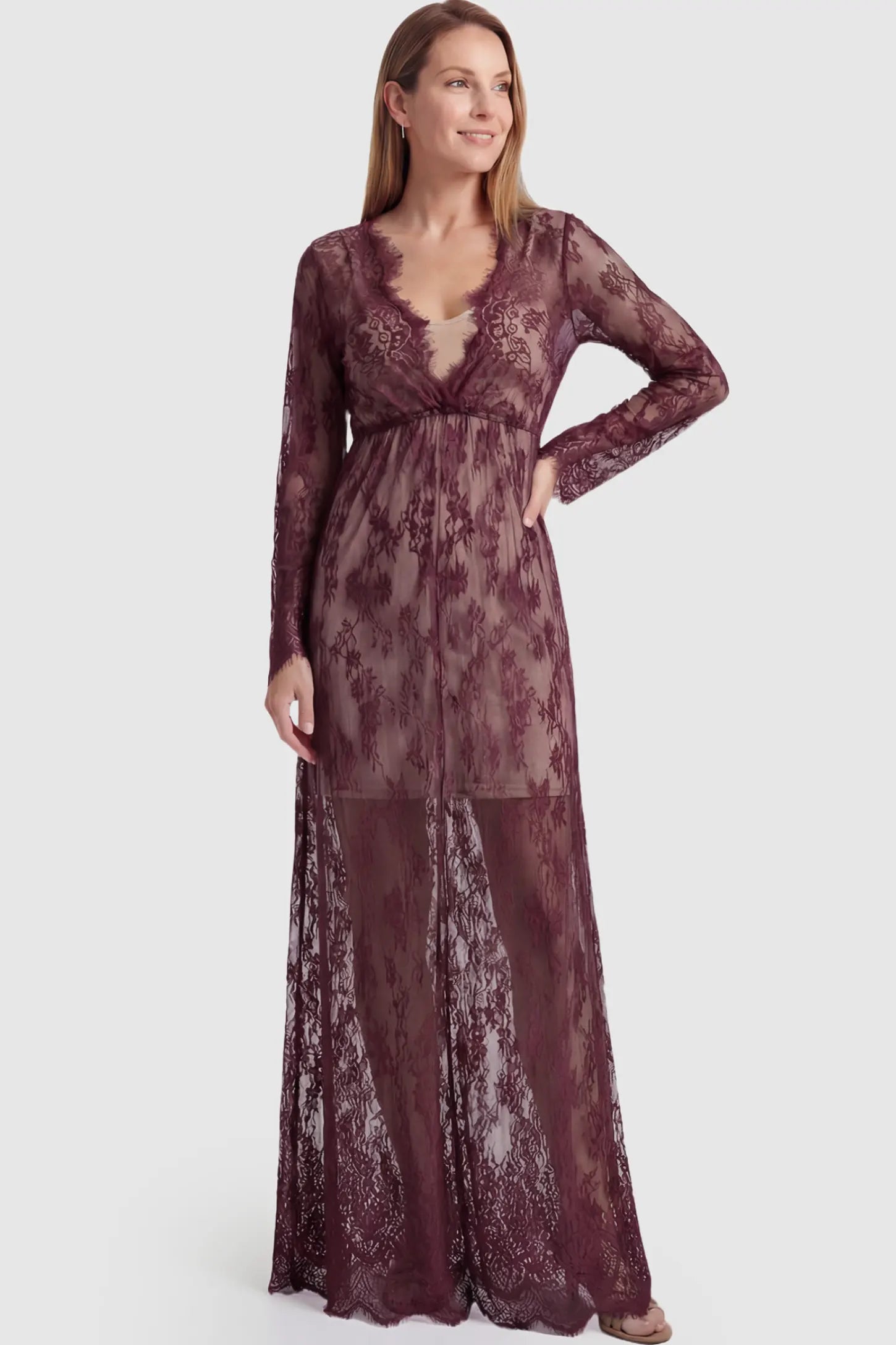 Floral Sheer Lace Long Sleeve Maternity Photoshoot Gown Floral Sheer Lace Maternity Gown in Burgundy featuring scalloped v-neck and long sleeves on a postpartum model showing front.