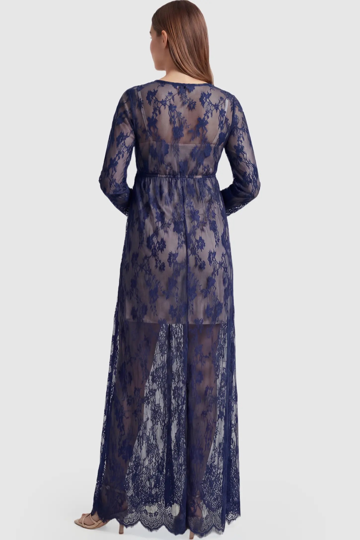 Floral Sheer Lace Long Sleeve Maternity Photoshoot Gown Floral Sheer Lace Maternity Gown in Dark Blue featuring long sleeves on a pregnant model showing back.