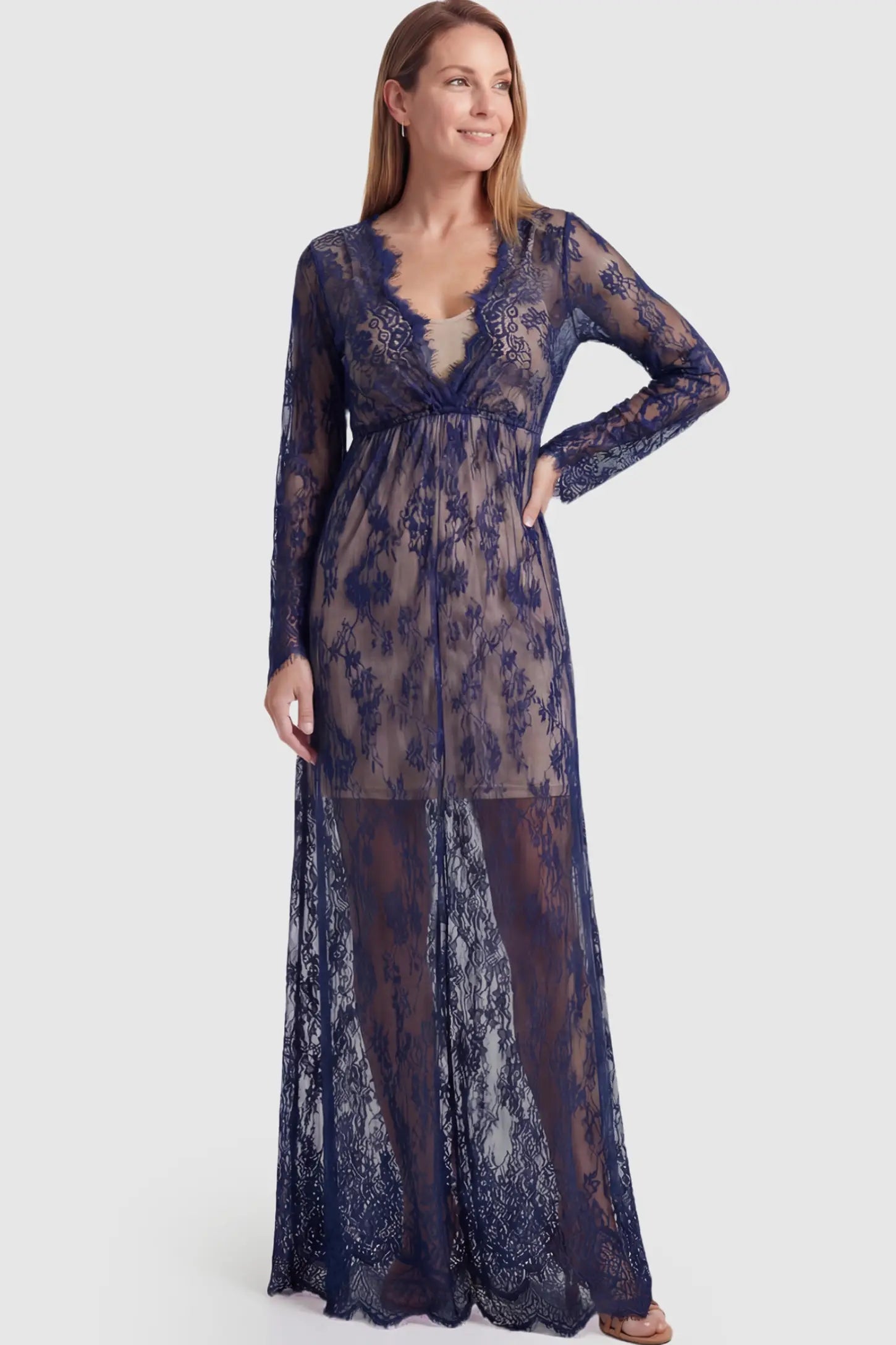 Floral Sheer Lace Long Sleeve Maternity Photoshoot Gown Floral Sheer Lace Maternity Gown in Dark Blue featuring scalloped v-neck and long sleeves on a postpartum model showing front.