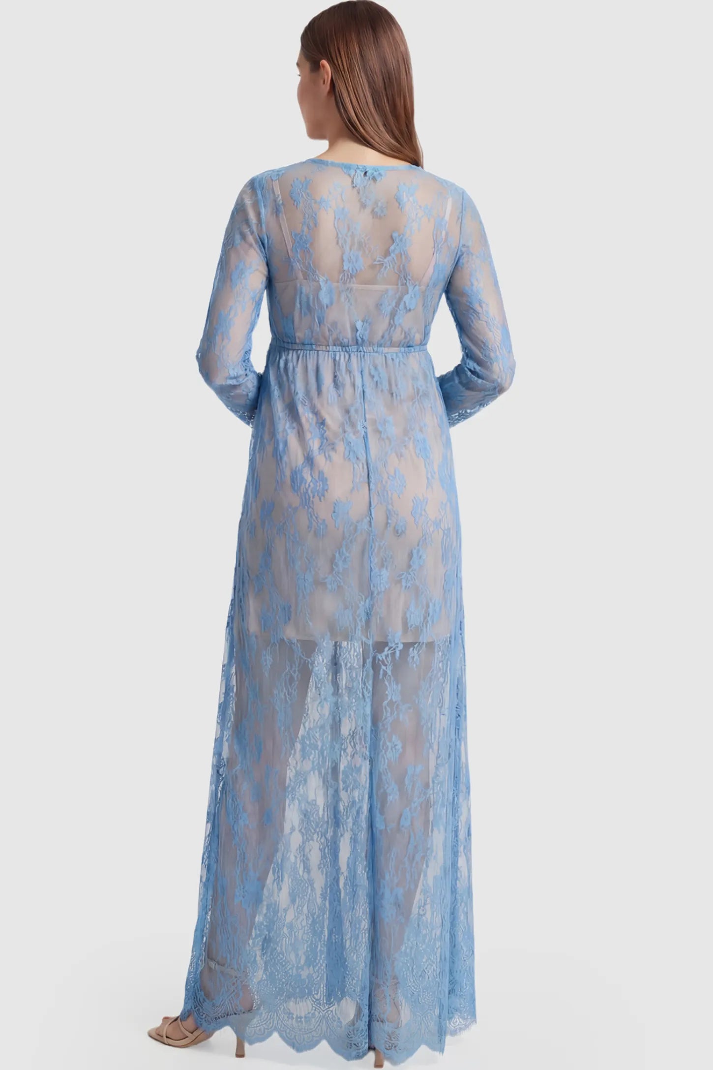 Floral Sheer Lace Long Sleeve Maternity Photoshoot Gown Floral Sheer Lace Maternity Gown in Light Blue featuring long sleeves on a pregnant model showing back.