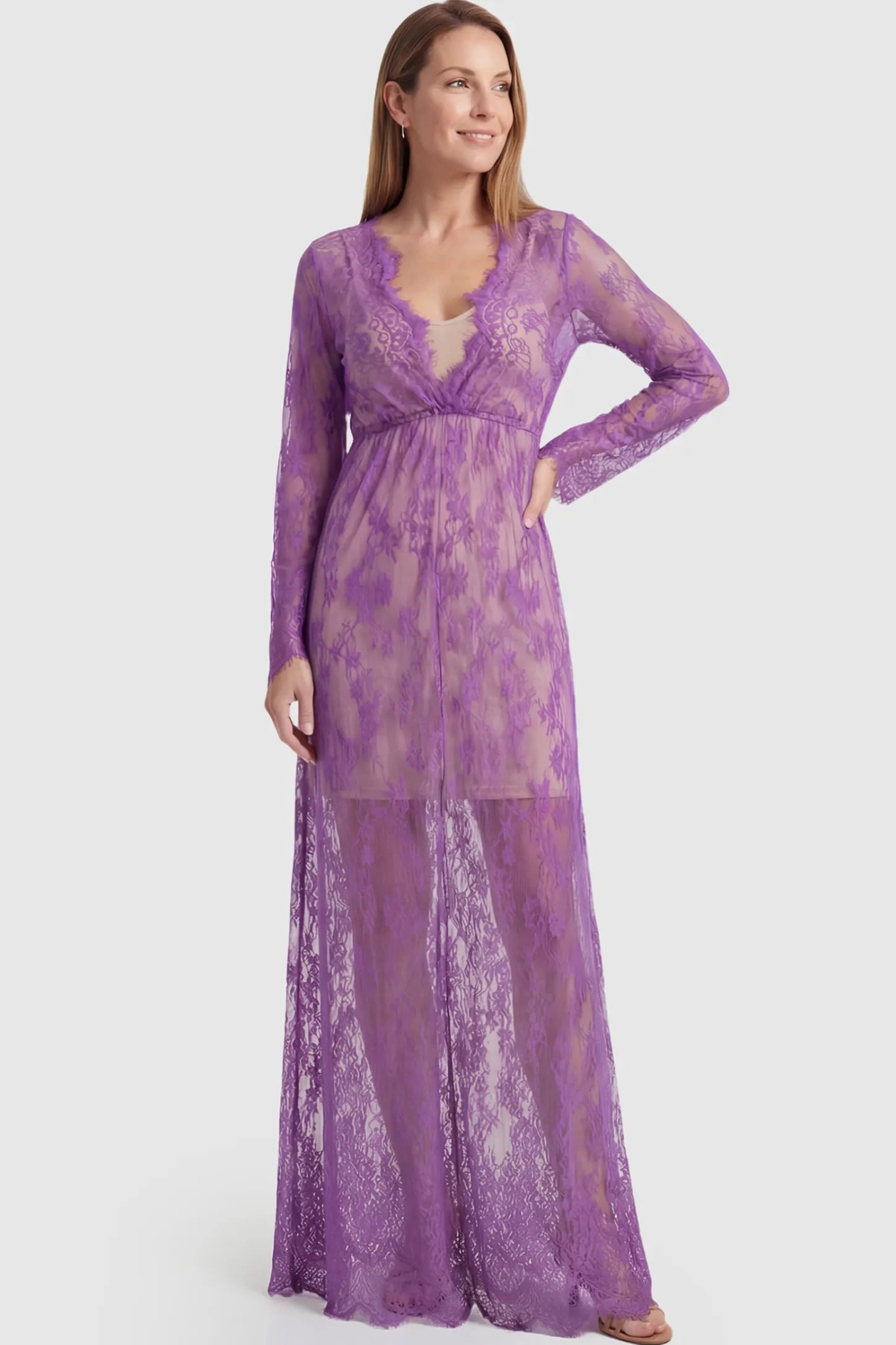 Floral Sheer Lace Long Sleeve Maternity Photoshoot Gown Floral Sheer Lace Maternity Gown in Purple featuring scalloped v-neck and long sleeves on a postpartum model showing front.