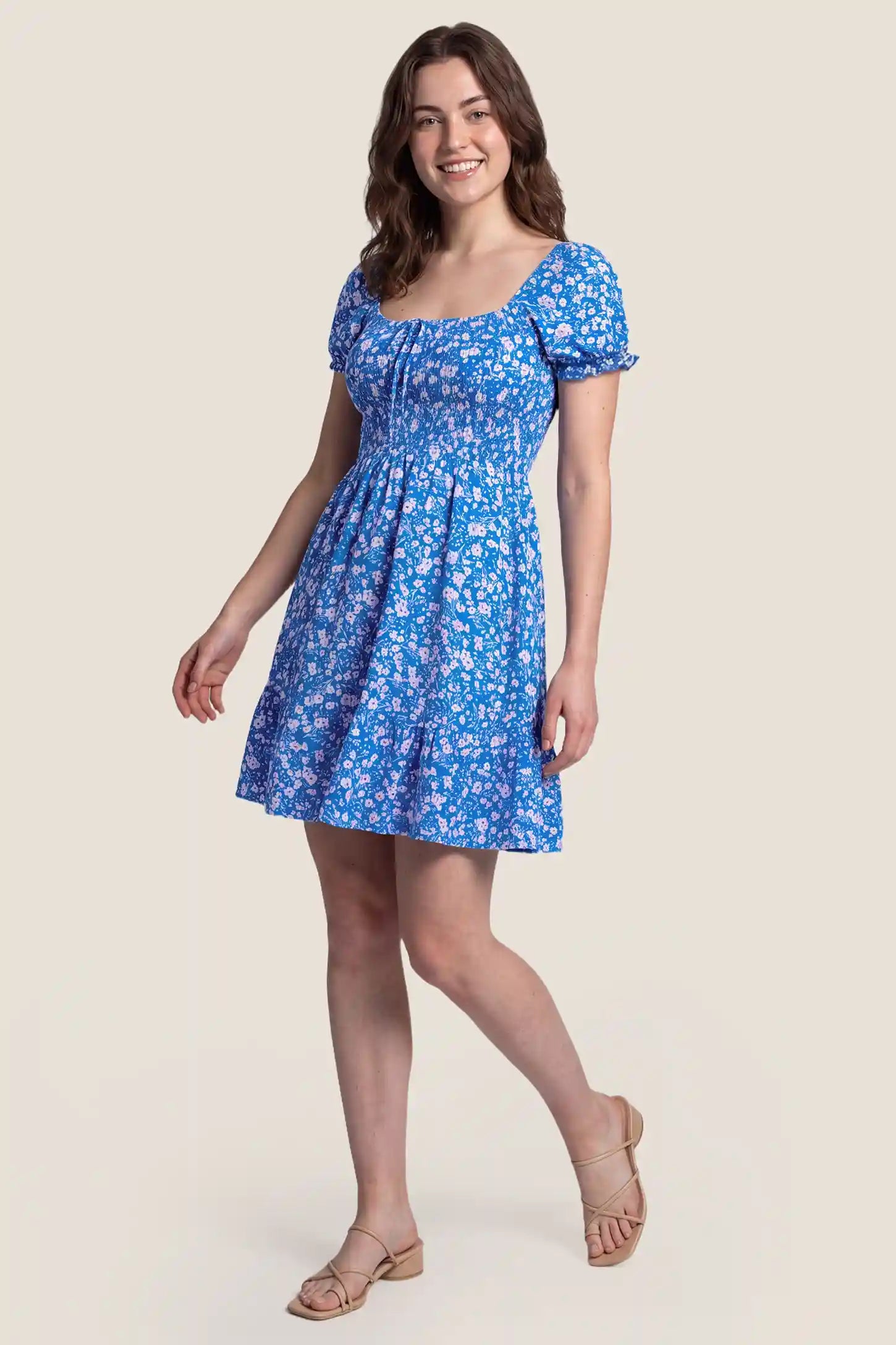 Floral Smocked Puff Sleeve Maternity Dress Floral Smocked Puff Sleeve Maternity Dress in Ocean Blue with sweet style, front view on a non pregnant model.
